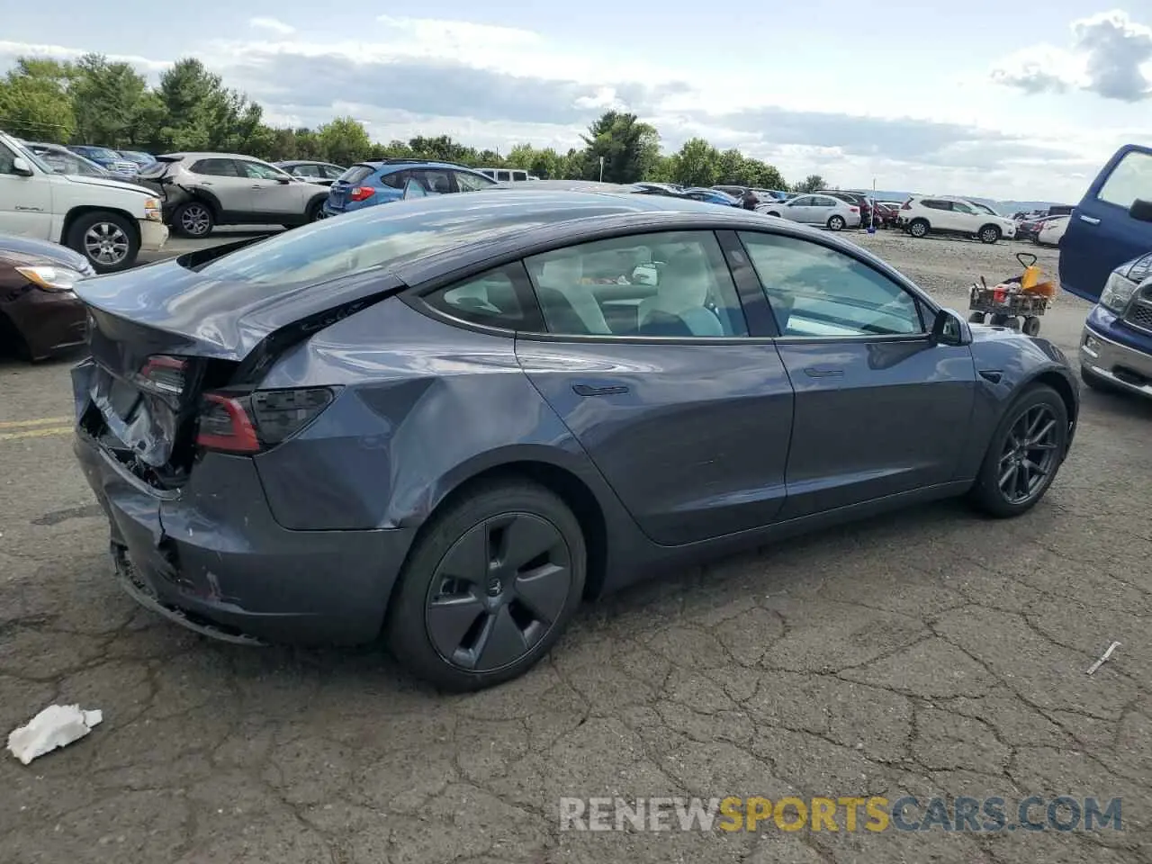 3 Photograph of a damaged car 5YJ3E1EA2PF704301 TESLA MODEL 3 2023
