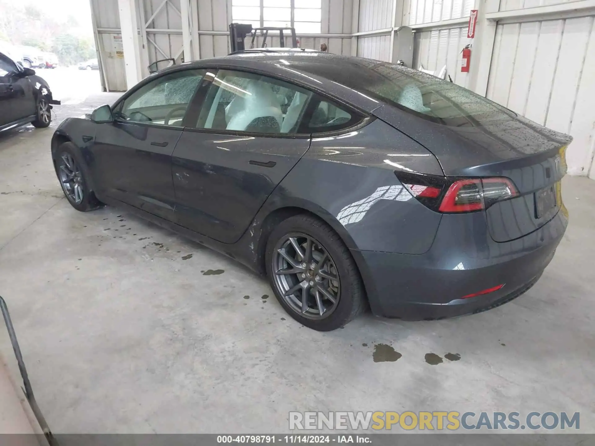 3 Photograph of a damaged car 5YJ3E1EA3PF382686 TESLA MODEL 3 2023