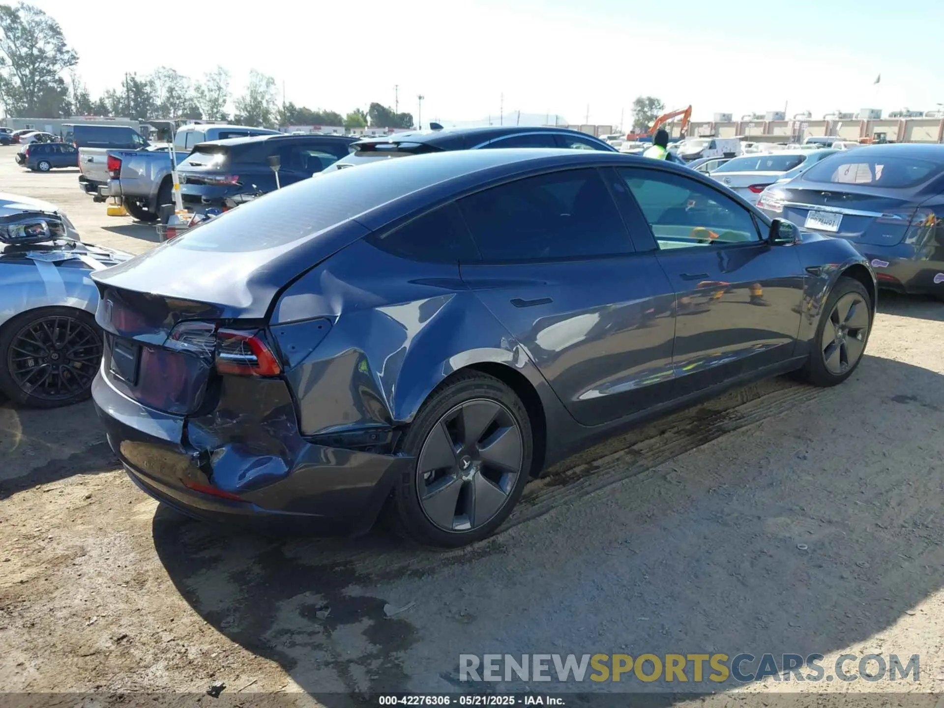 4 Photograph of a damaged car 5YJ3E1EA3PF412267 TESLA MODEL 3 2023