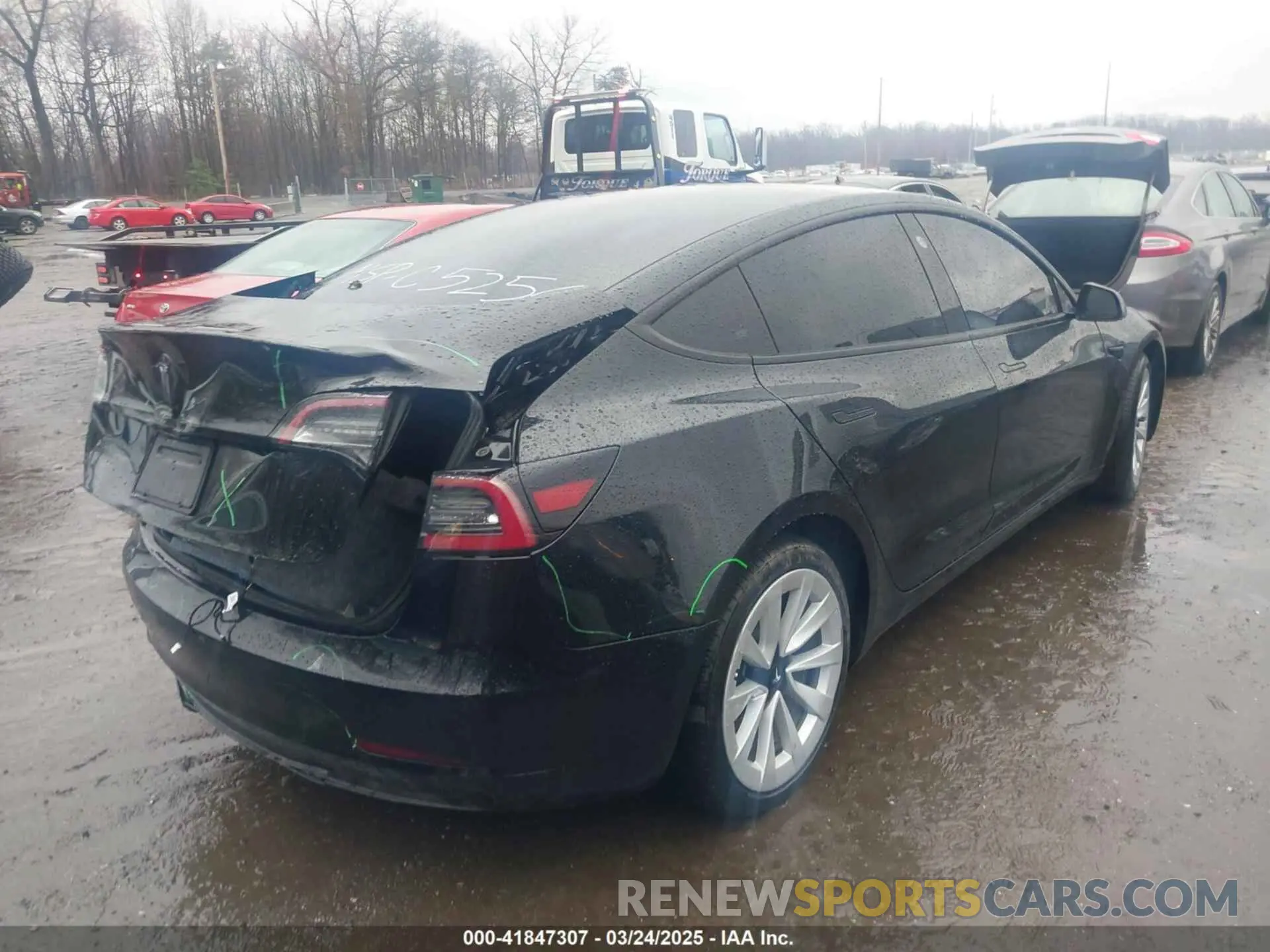 4 Photograph of a damaged car 5YJ3E1EA3PF435256 TESLA MODEL 3 2023