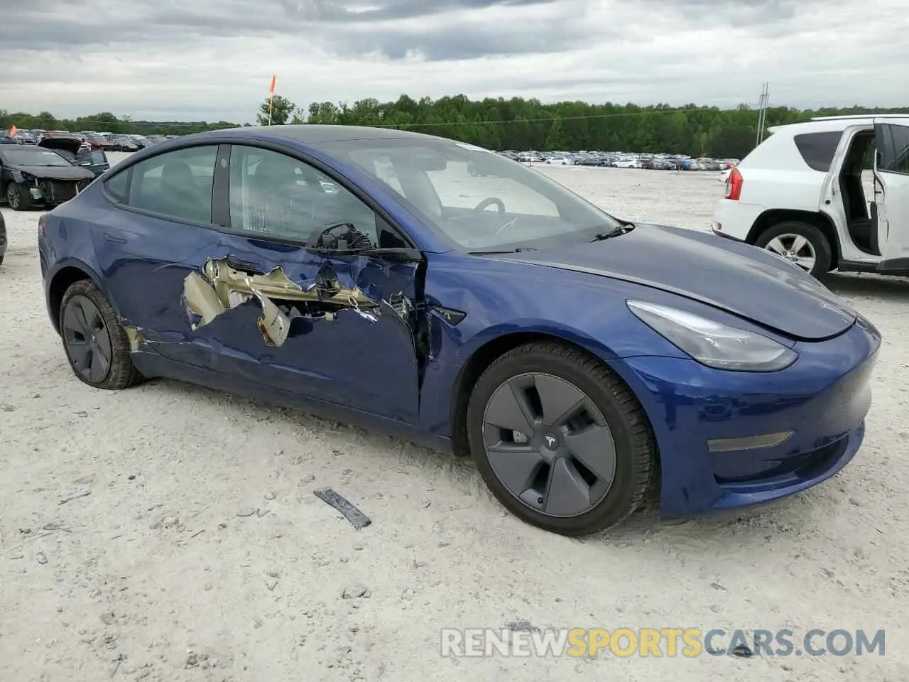4 Photograph of a damaged car 5YJ3E1EA3PF474350 TESLA MODEL 3 2023