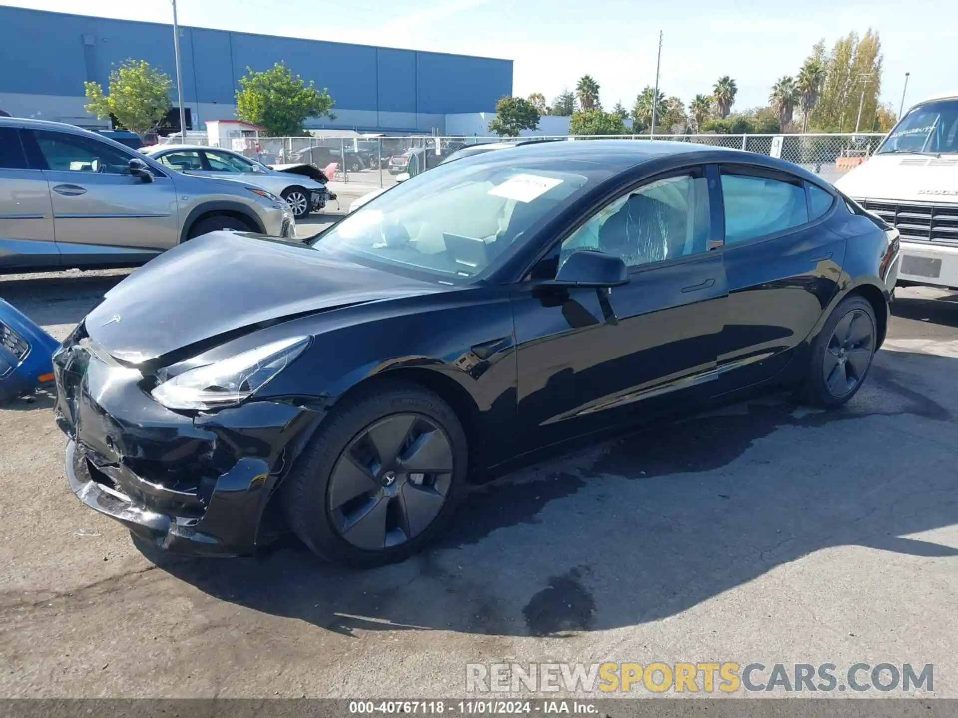 2 Photograph of a damaged car 5YJ3E1EA3PF518766 TESLA MODEL 3 2023