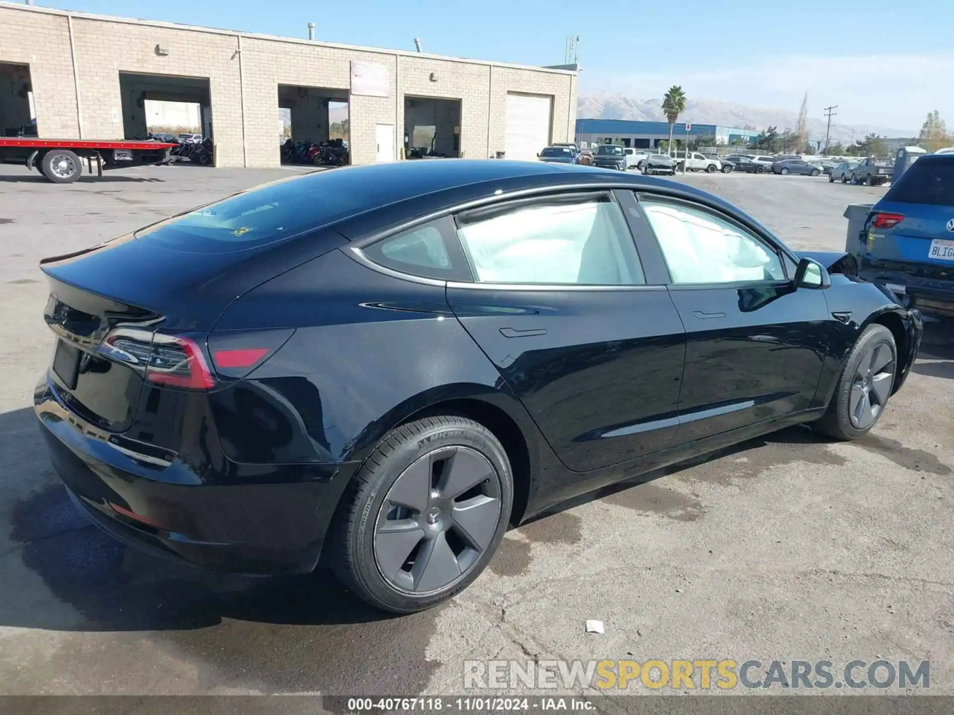 4 Photograph of a damaged car 5YJ3E1EA3PF518766 TESLA MODEL 3 2023