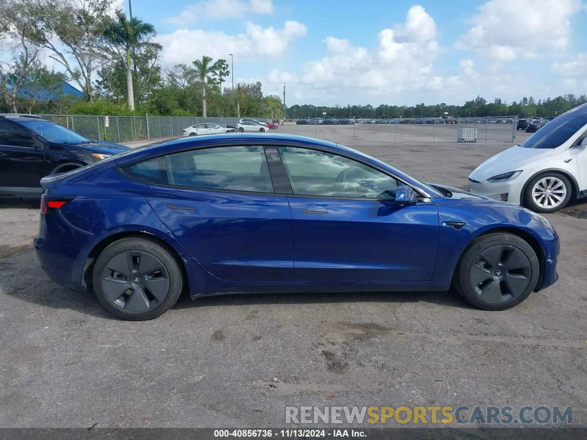 13 Photograph of a damaged car 5YJ3E1EA3PF556403 TESLA MODEL 3 2023
