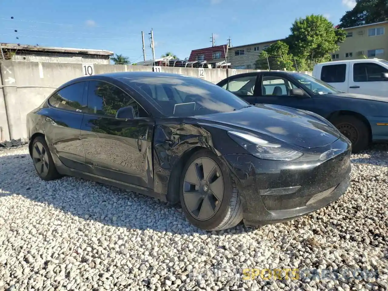 4 Photograph of a damaged car 5YJ3E1EA3PF595248 TESLA MODEL 3 2023