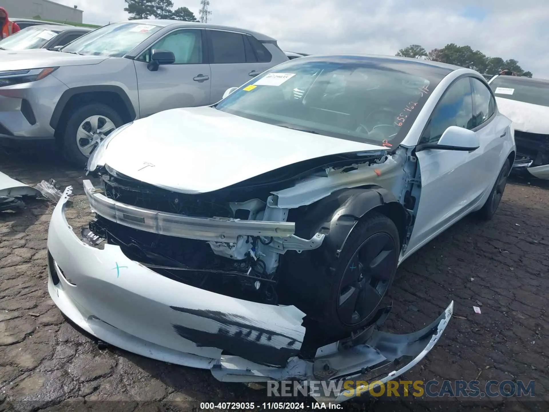 6 Photograph of a damaged car 5YJ3E1EA3PF658462 TESLA MODEL 3 2023