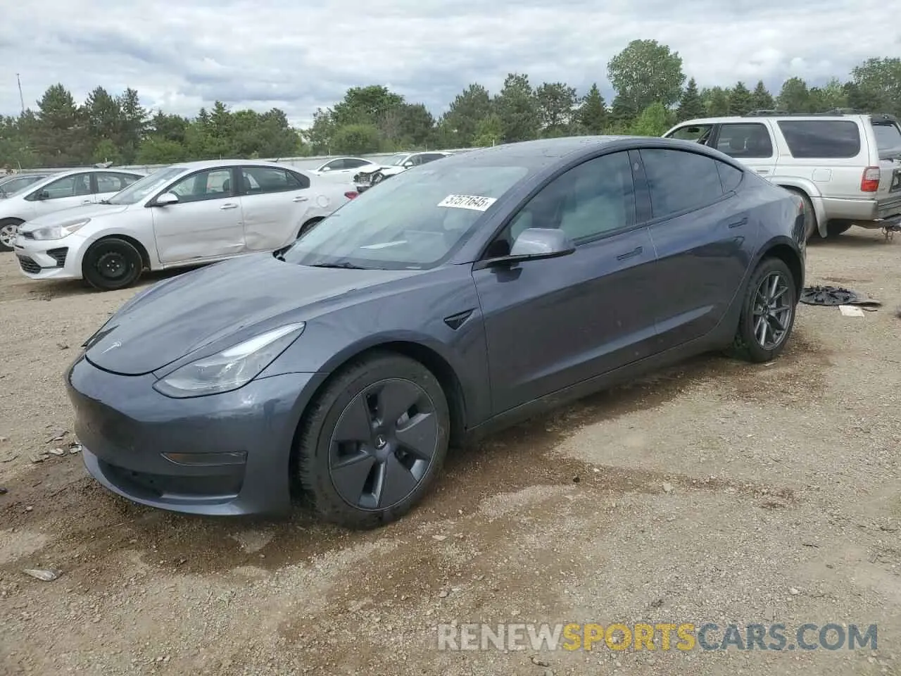 1 Photograph of a damaged car 5YJ3E1EA3PF672023 TESLA MODEL 3 2023