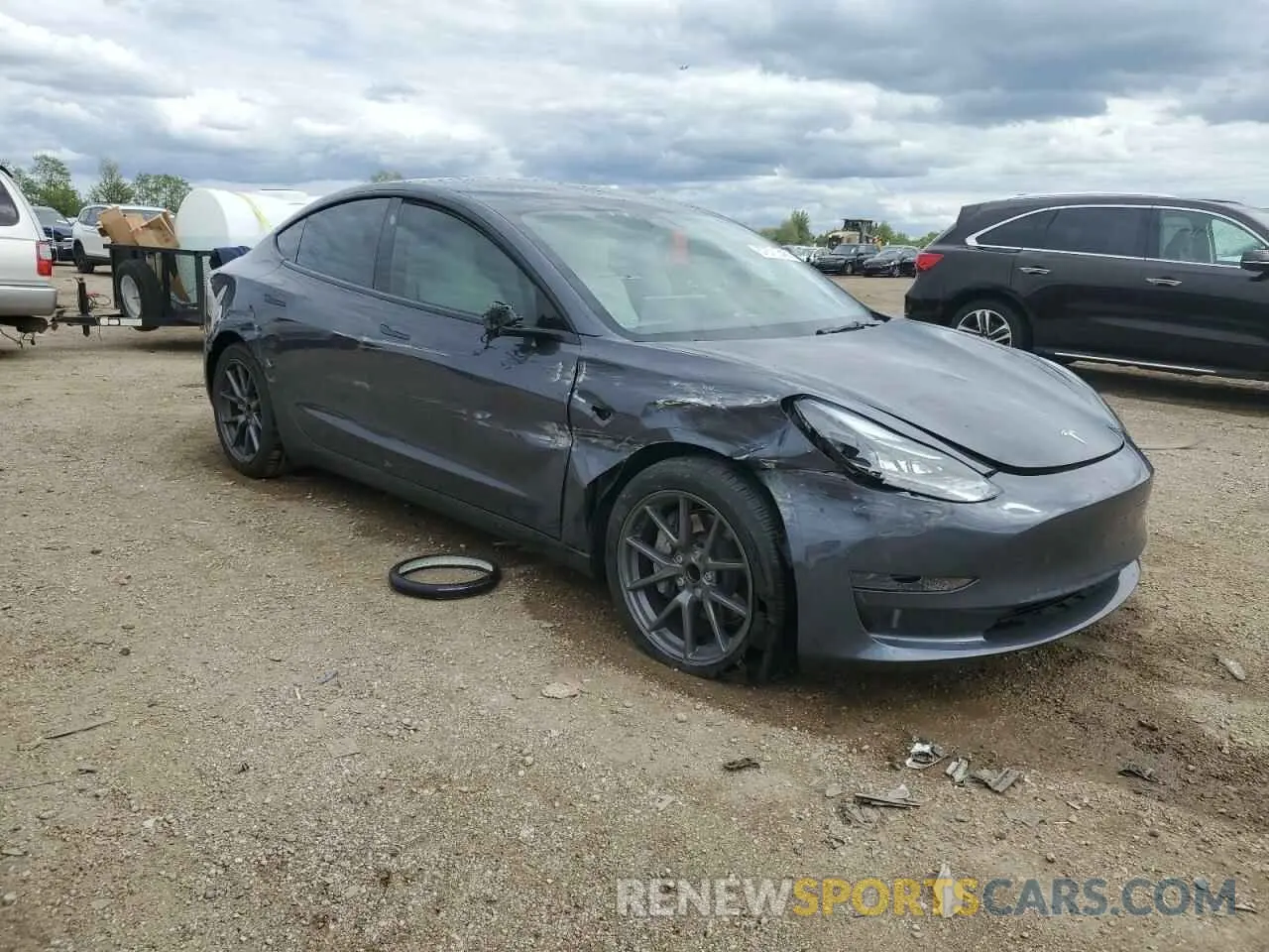 4 Photograph of a damaged car 5YJ3E1EA3PF672023 TESLA MODEL 3 2023
