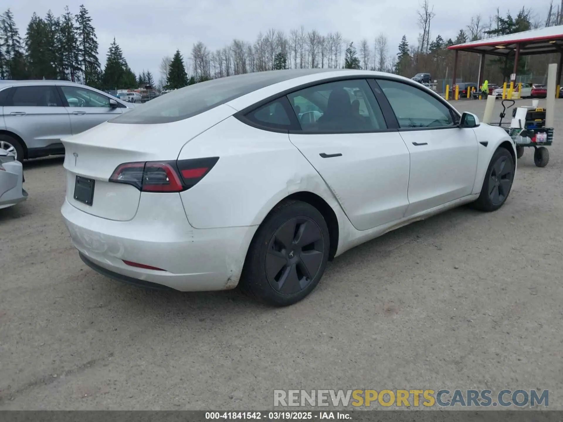 4 Photograph of a damaged car 5YJ3E1EA3PF672815 TESLA MODEL 3 2023