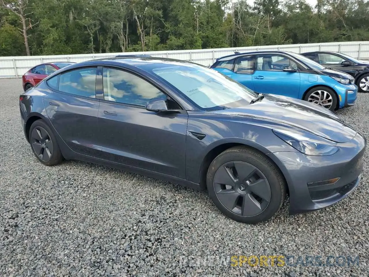 4 Photograph of a damaged car 5YJ3E1EA3PF699657 TESLA MODEL 3 2023
