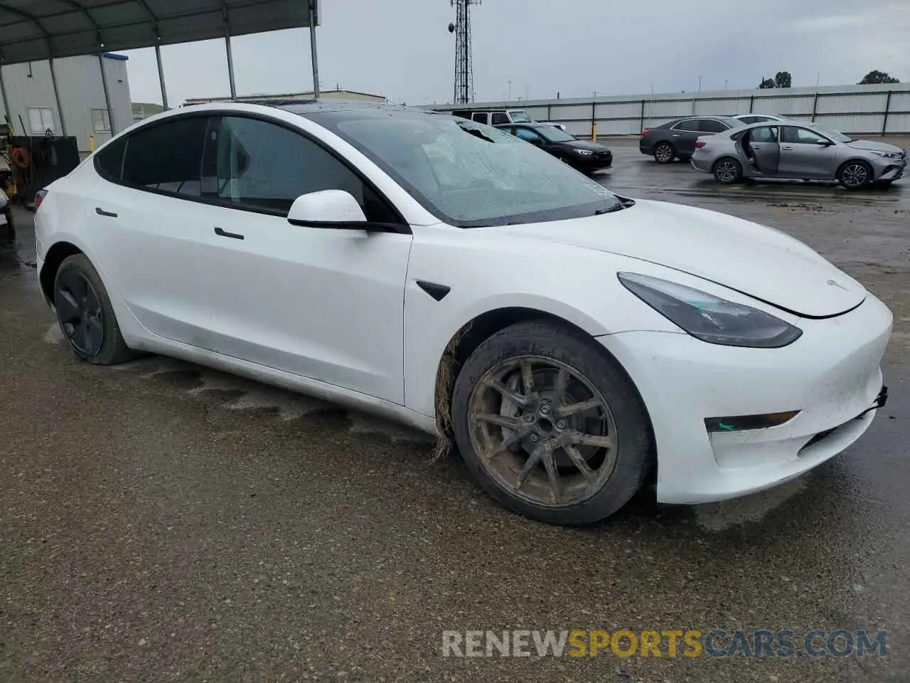 4 Photograph of a damaged car 5YJ3E1EA3PF709958 TESLA MODEL 3 2023