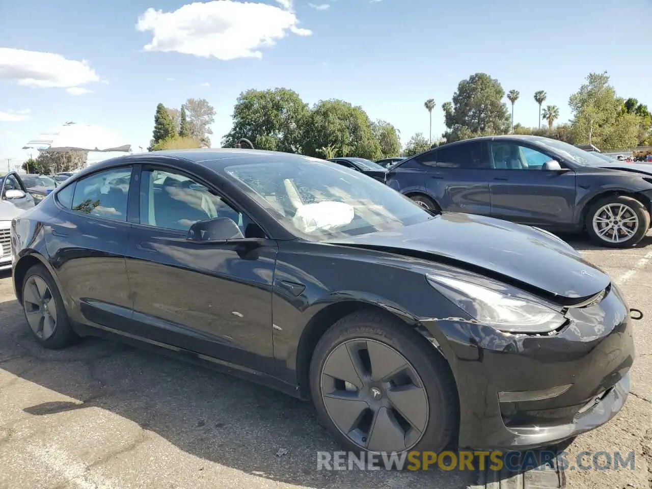 4 Photograph of a damaged car 5YJ3E1EA3PF713735 TESLA MODEL 3 2023