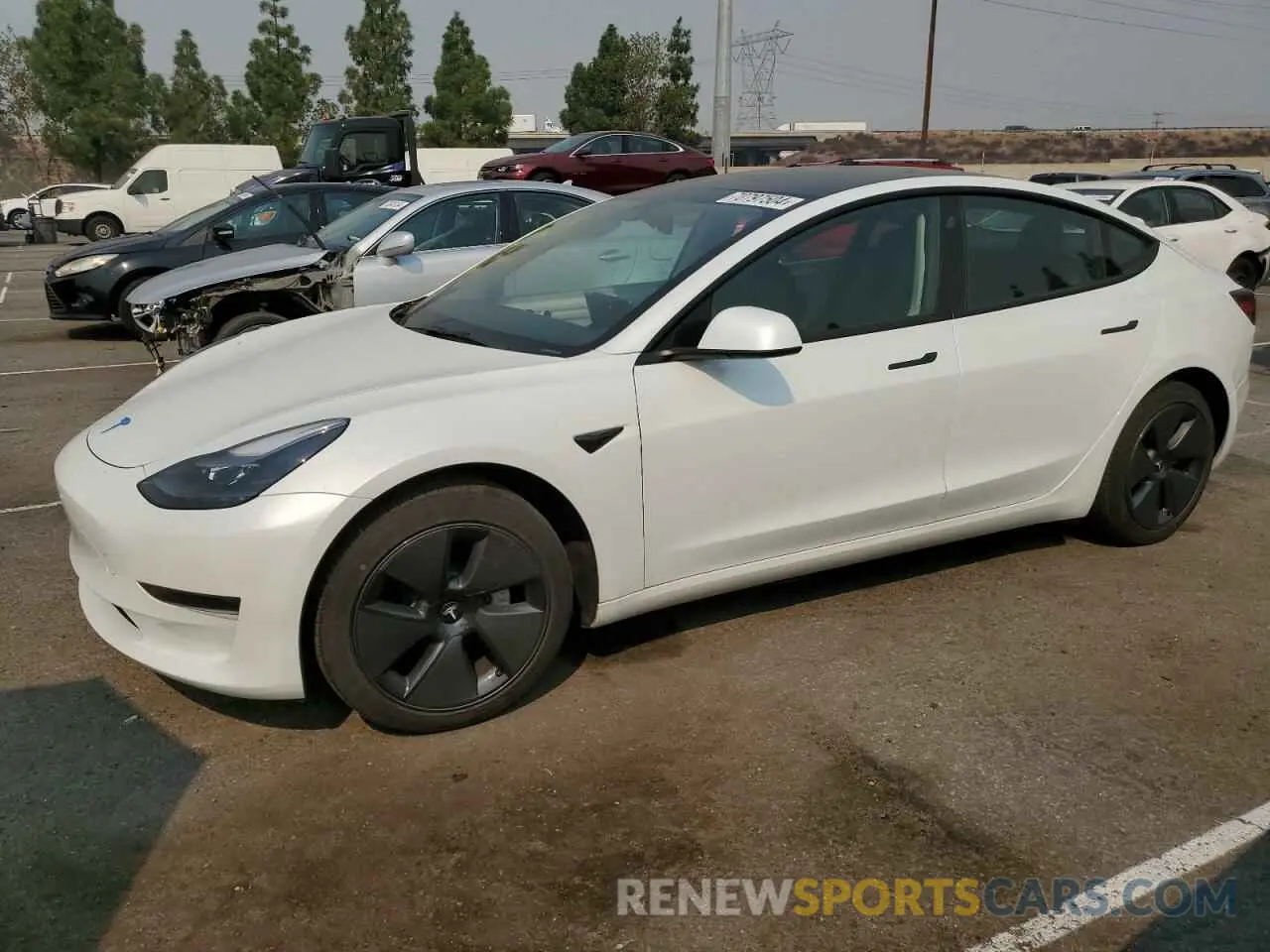 1 Photograph of a damaged car 5YJ3E1EA4PF385807 TESLA MODEL 3 2023