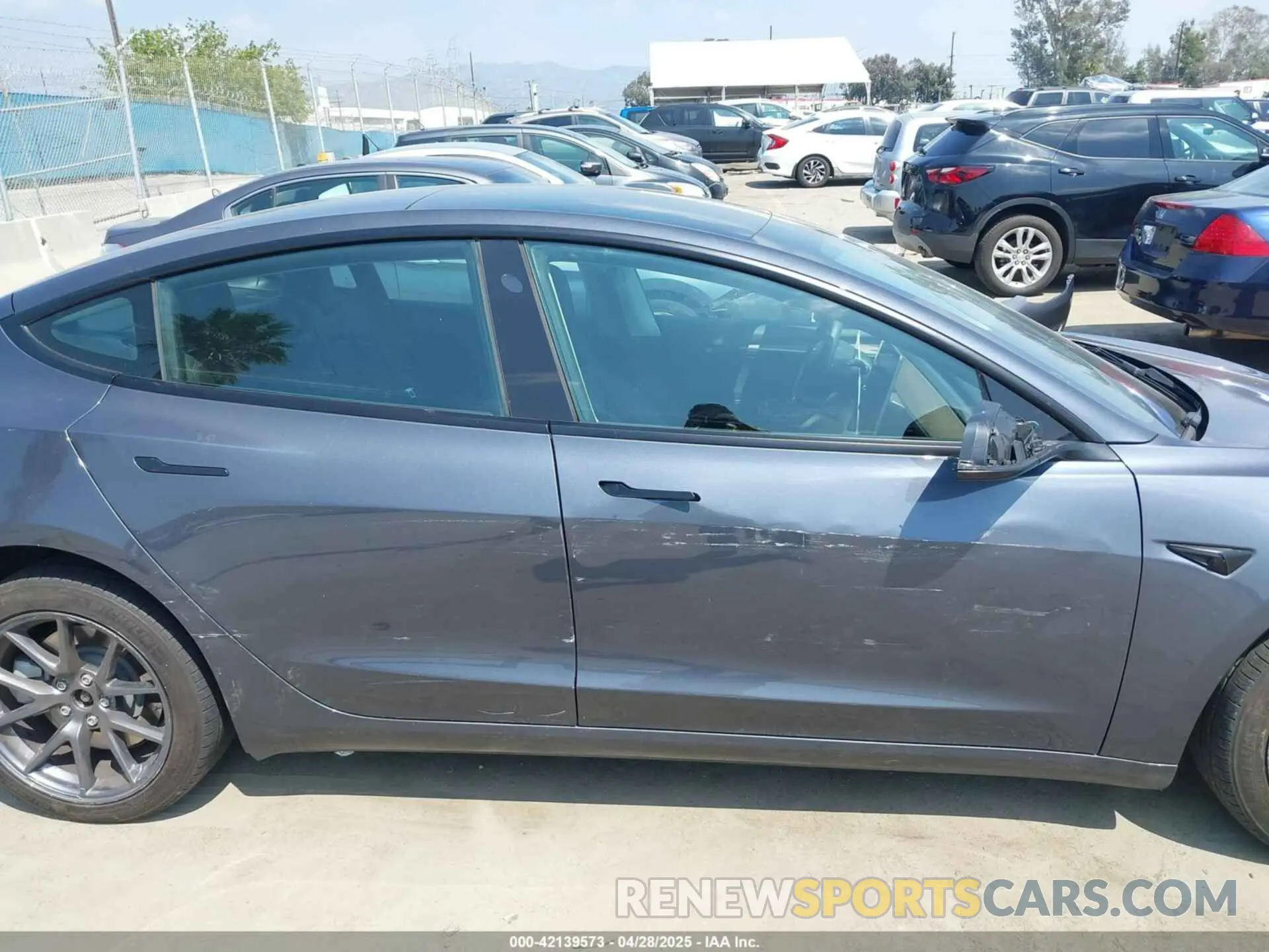 14 Photograph of a damaged car 5YJ3E1EA4PF398573 TESLA MODEL 3 2023
