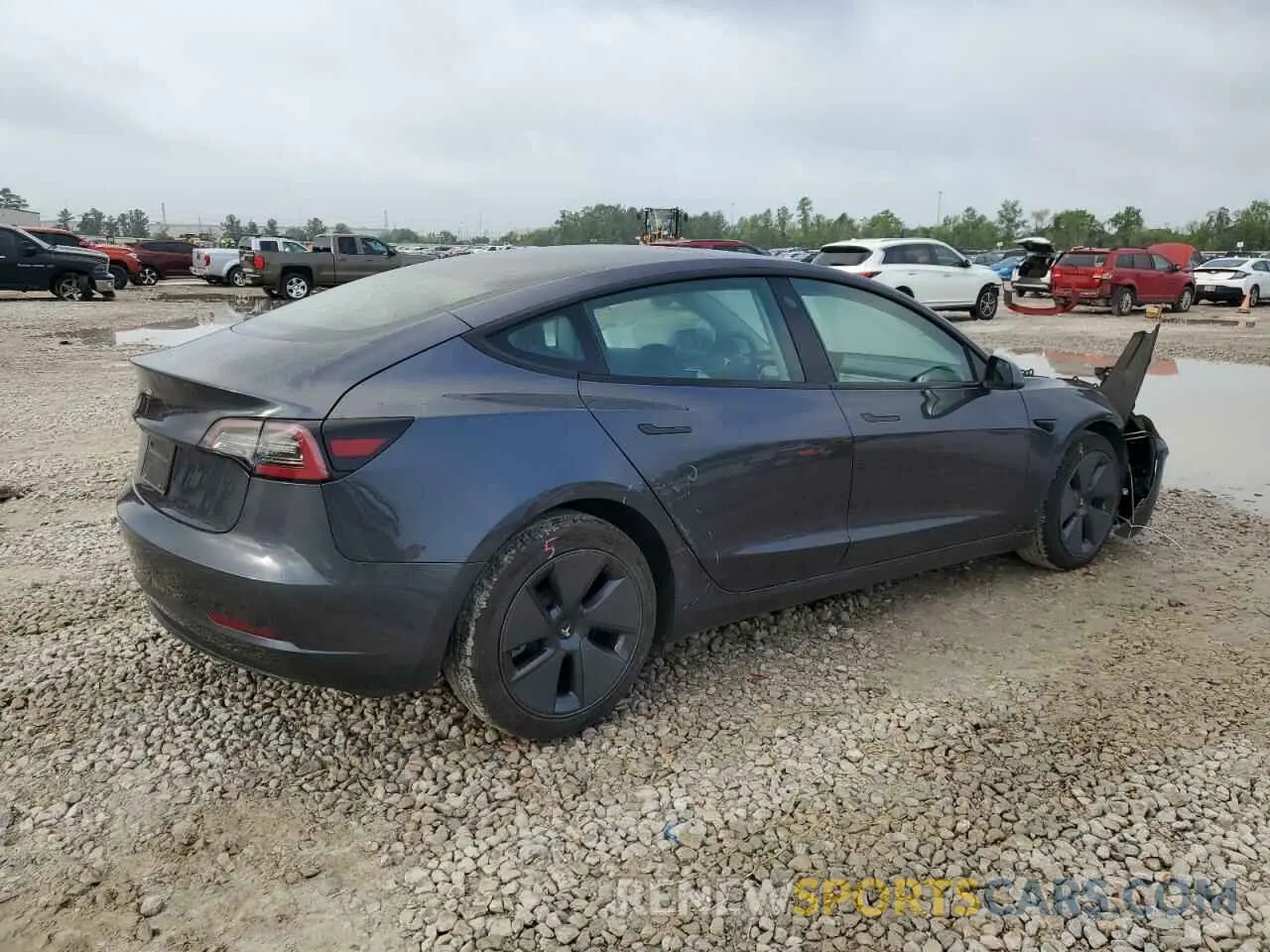 3 Photograph of a damaged car 5YJ3E1EA4PF402430 TESLA MODEL 3 2023