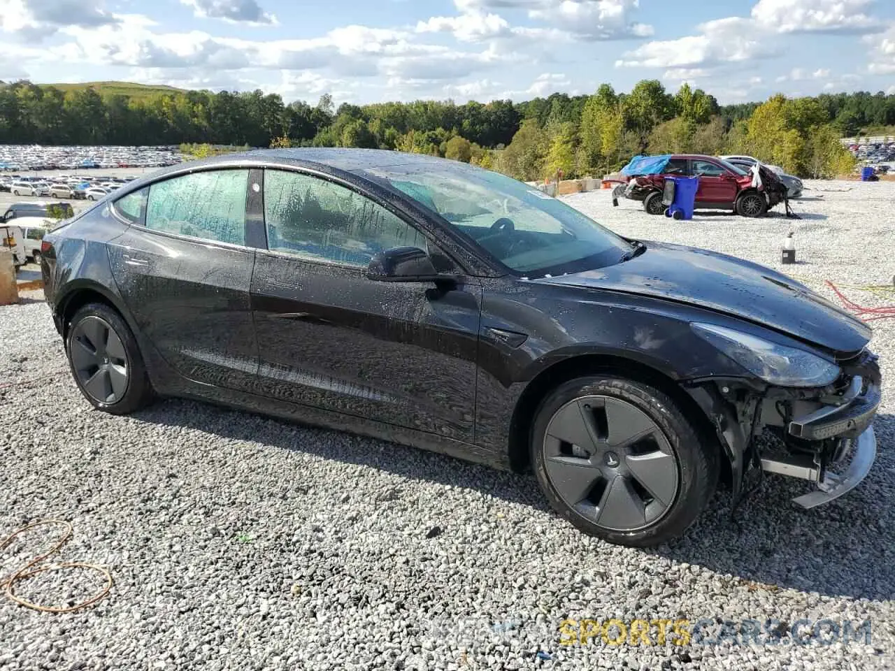 4 Photograph of a damaged car 5YJ3E1EA4PF459226 TESLA MODEL 3 2023