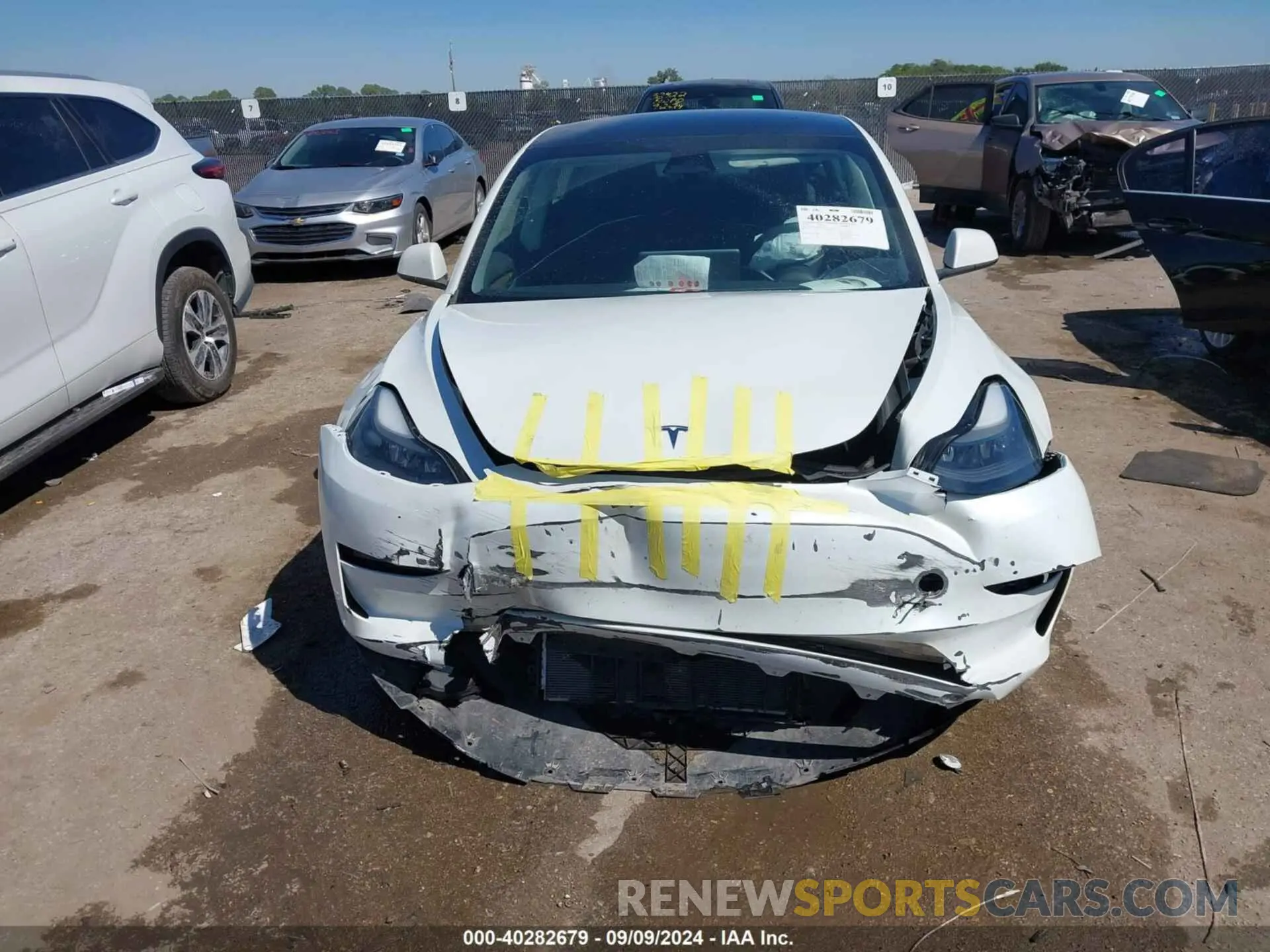 12 Photograph of a damaged car 5YJ3E1EA4PF475426 TESLA MODEL 3 2023