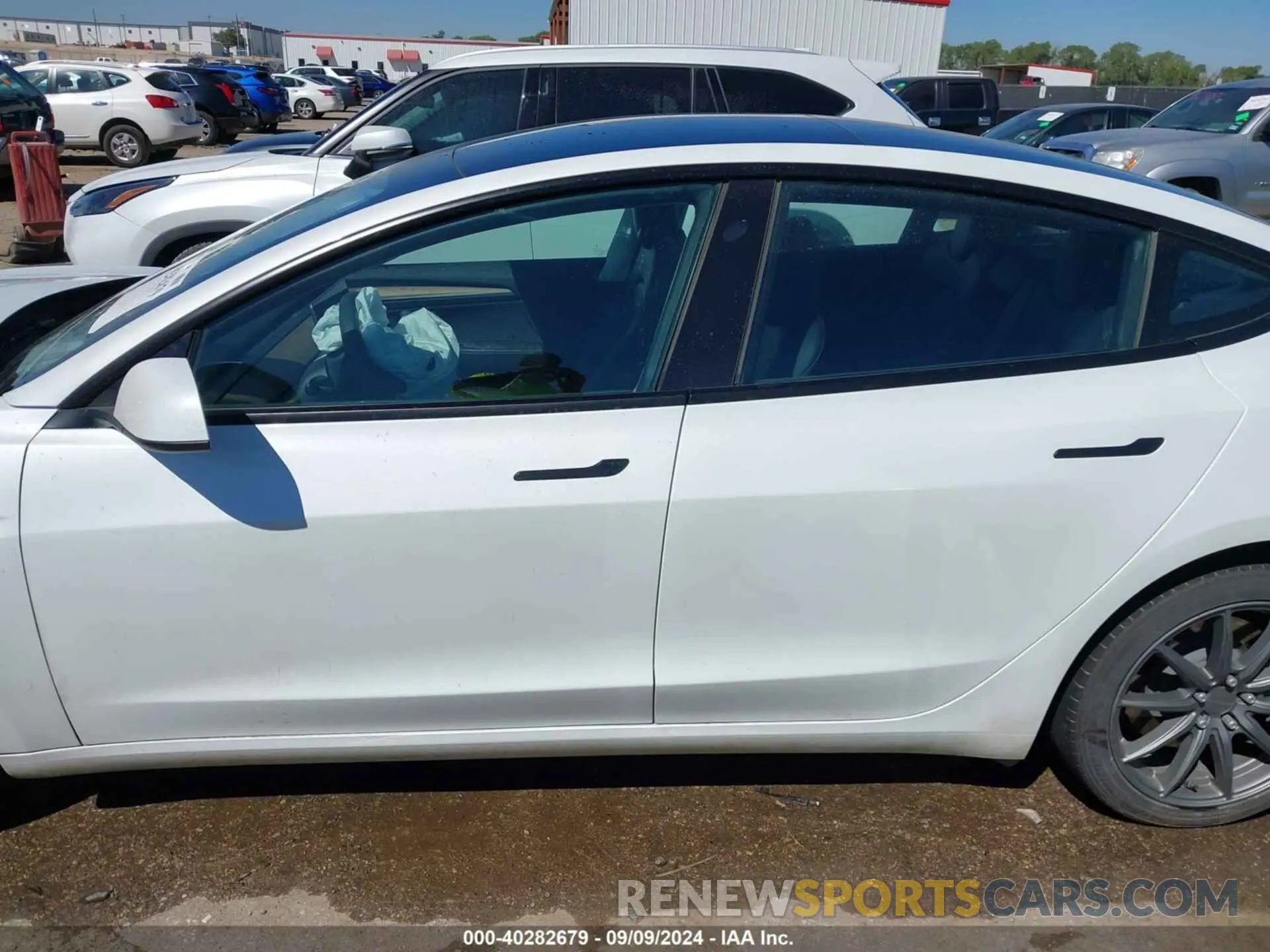 14 Photograph of a damaged car 5YJ3E1EA4PF475426 TESLA MODEL 3 2023