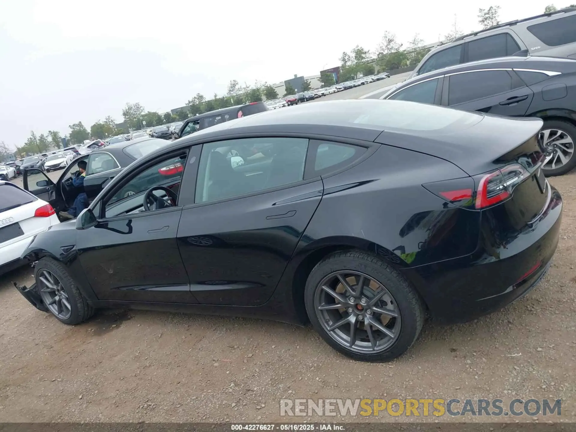 14 Photograph of a damaged car 5YJ3E1EA4PF497068 TESLA MODEL 3 2023
