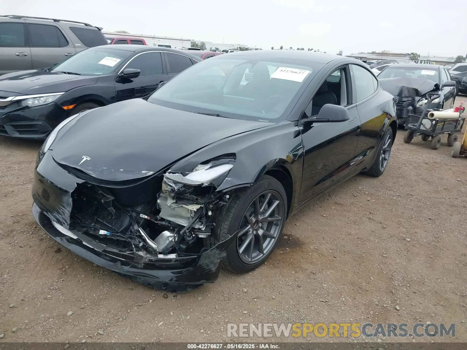 2 Photograph of a damaged car 5YJ3E1EA4PF497068 TESLA MODEL 3 2023