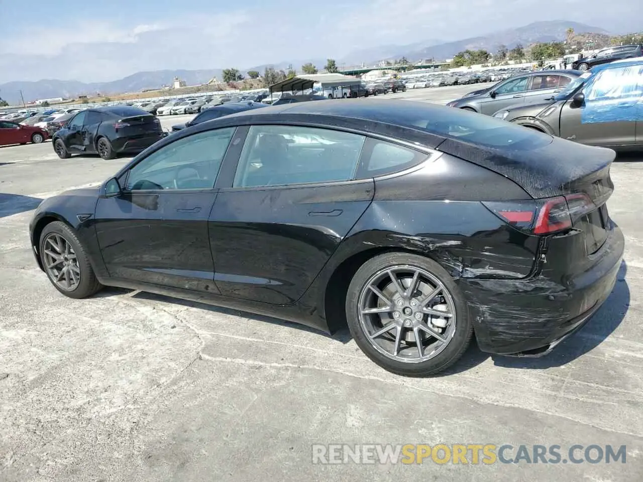 2 Photograph of a damaged car 5YJ3E1EA4PF509803 TESLA MODEL 3 2023