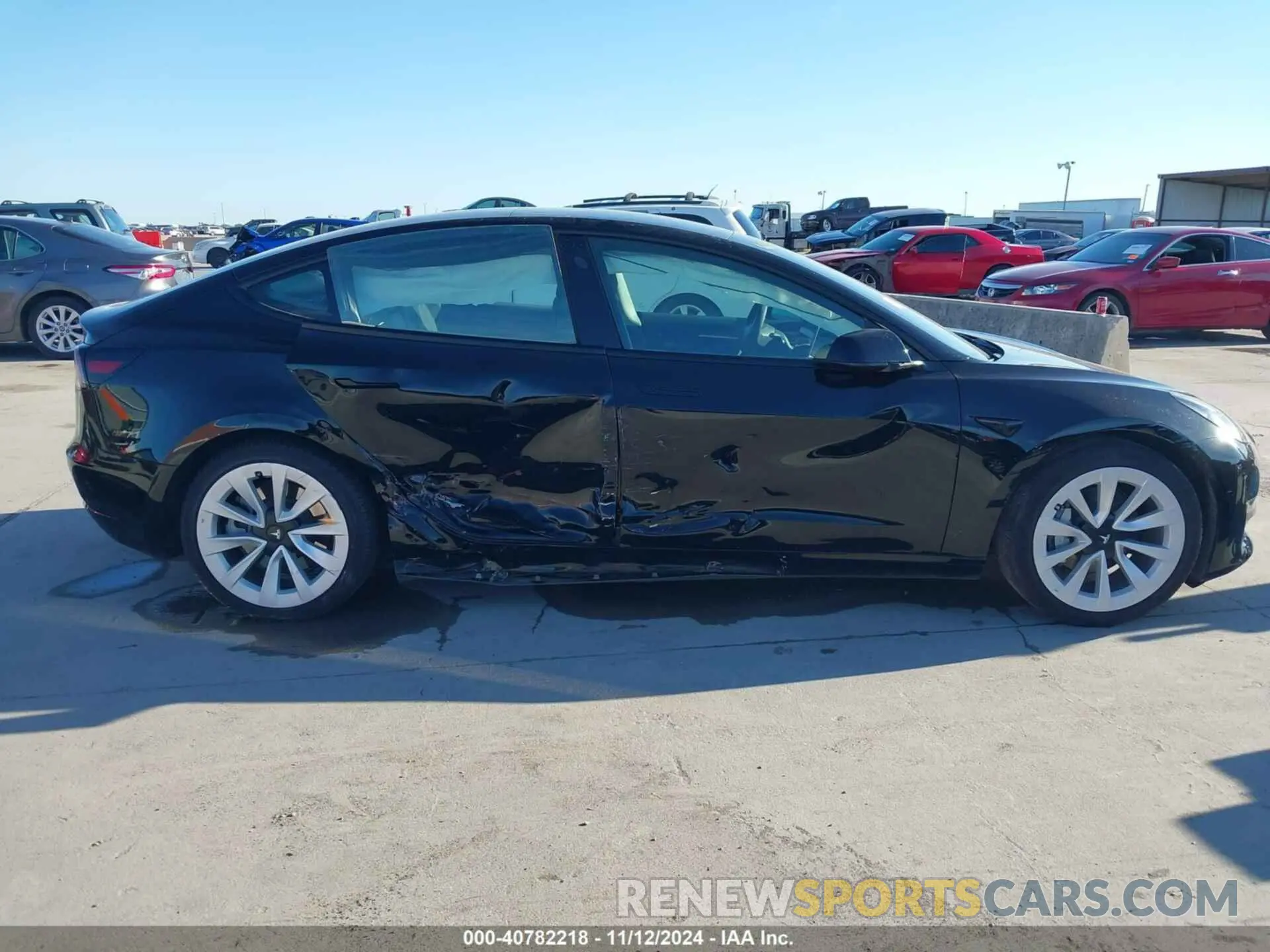 13 Photograph of a damaged car 5YJ3E1EA4PF552103 TESLA MODEL 3 2023