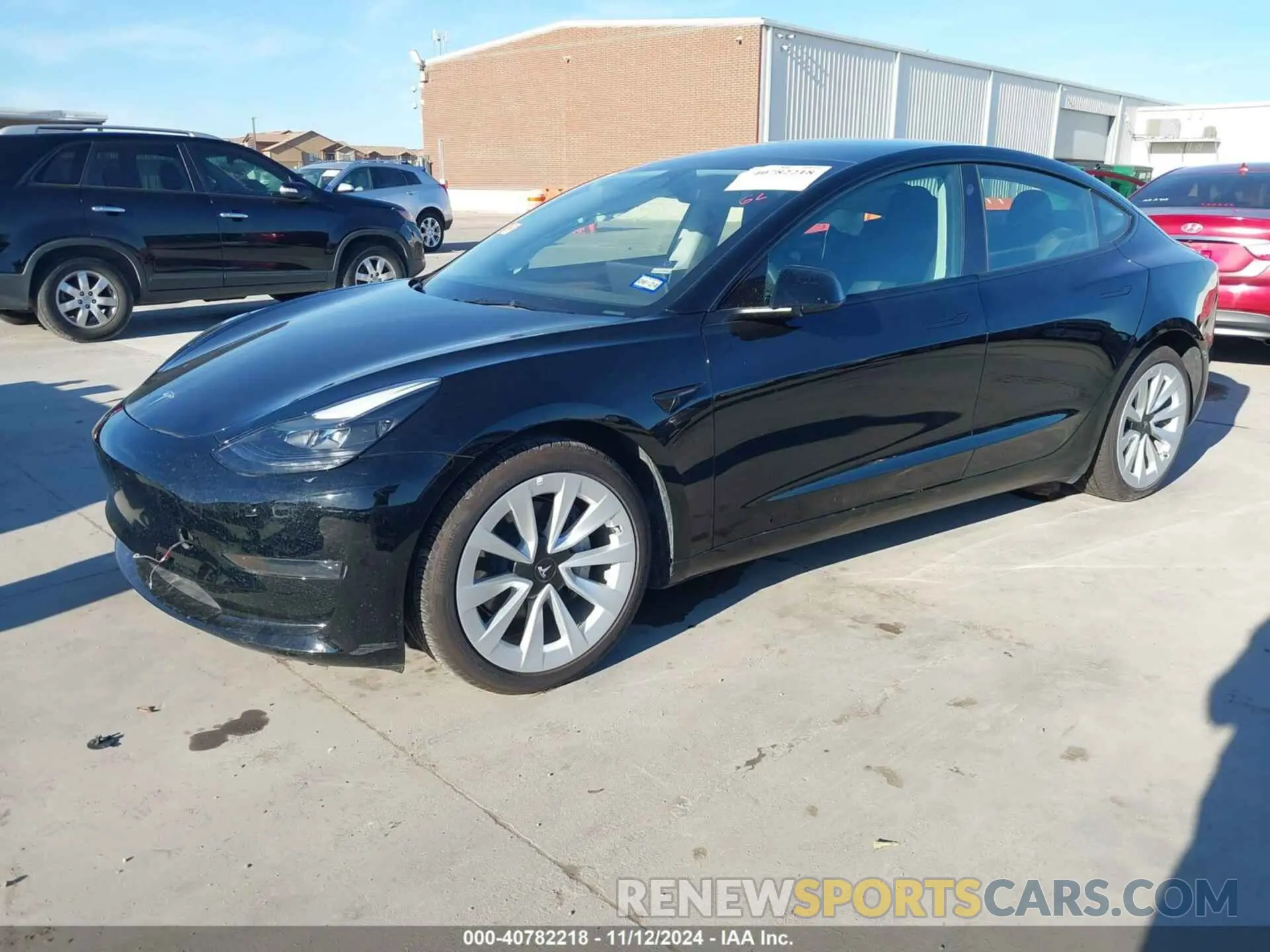2 Photograph of a damaged car 5YJ3E1EA4PF552103 TESLA MODEL 3 2023