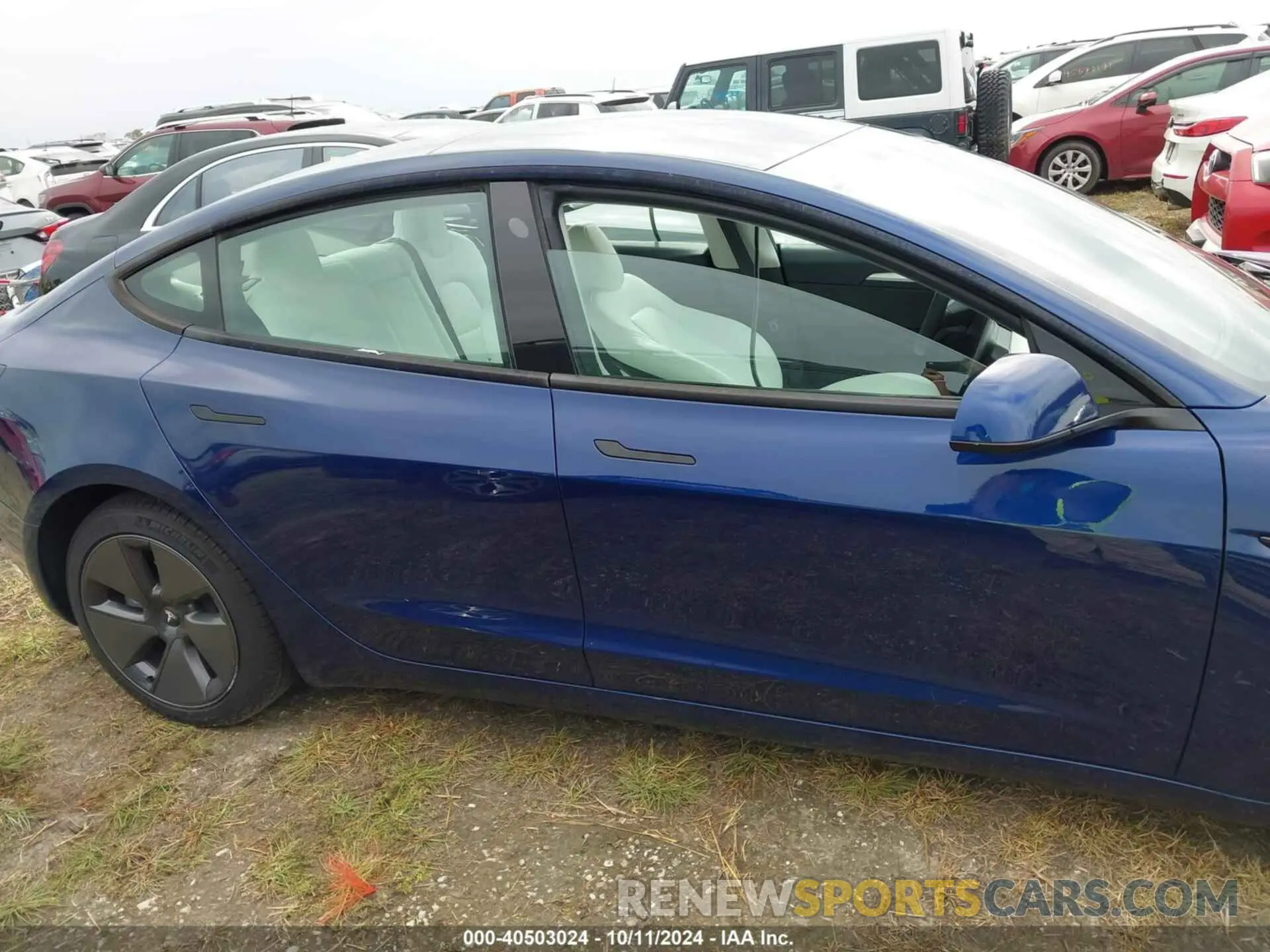 13 Photograph of a damaged car 5YJ3E1EA4PF553459 TESLA MODEL 3 2023
