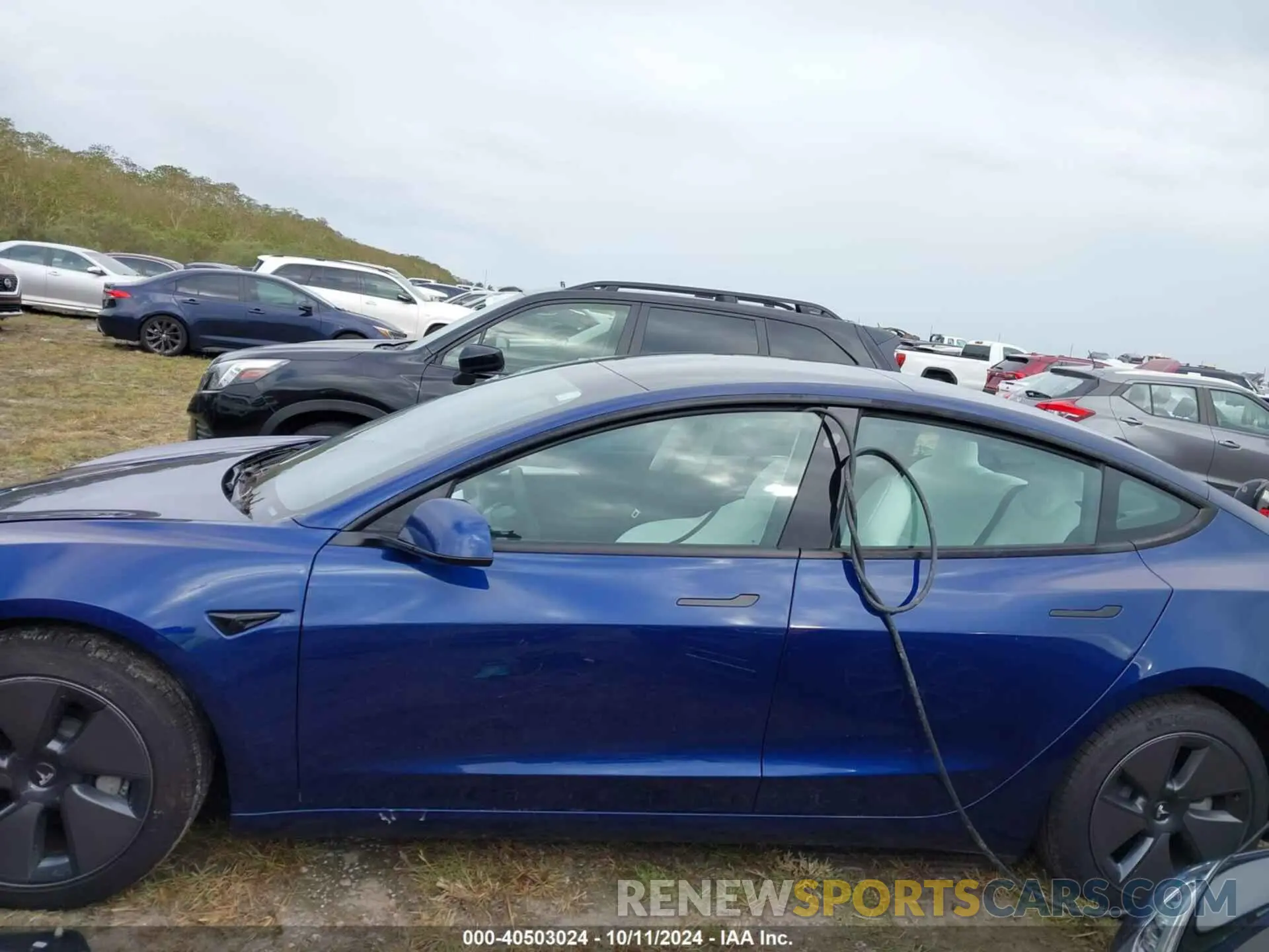 14 Photograph of a damaged car 5YJ3E1EA4PF553459 TESLA MODEL 3 2023