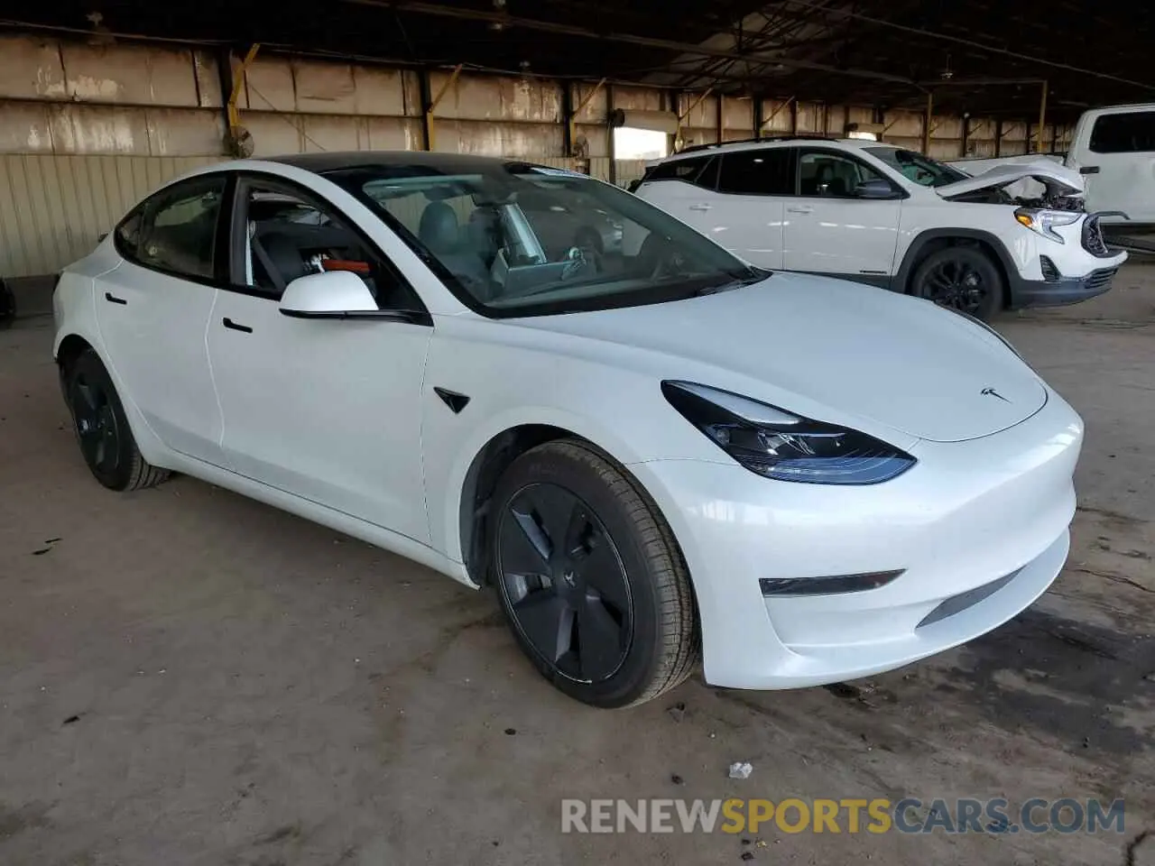 4 Photograph of a damaged car 5YJ3E1EA4PF556524 TESLA MODEL 3 2023