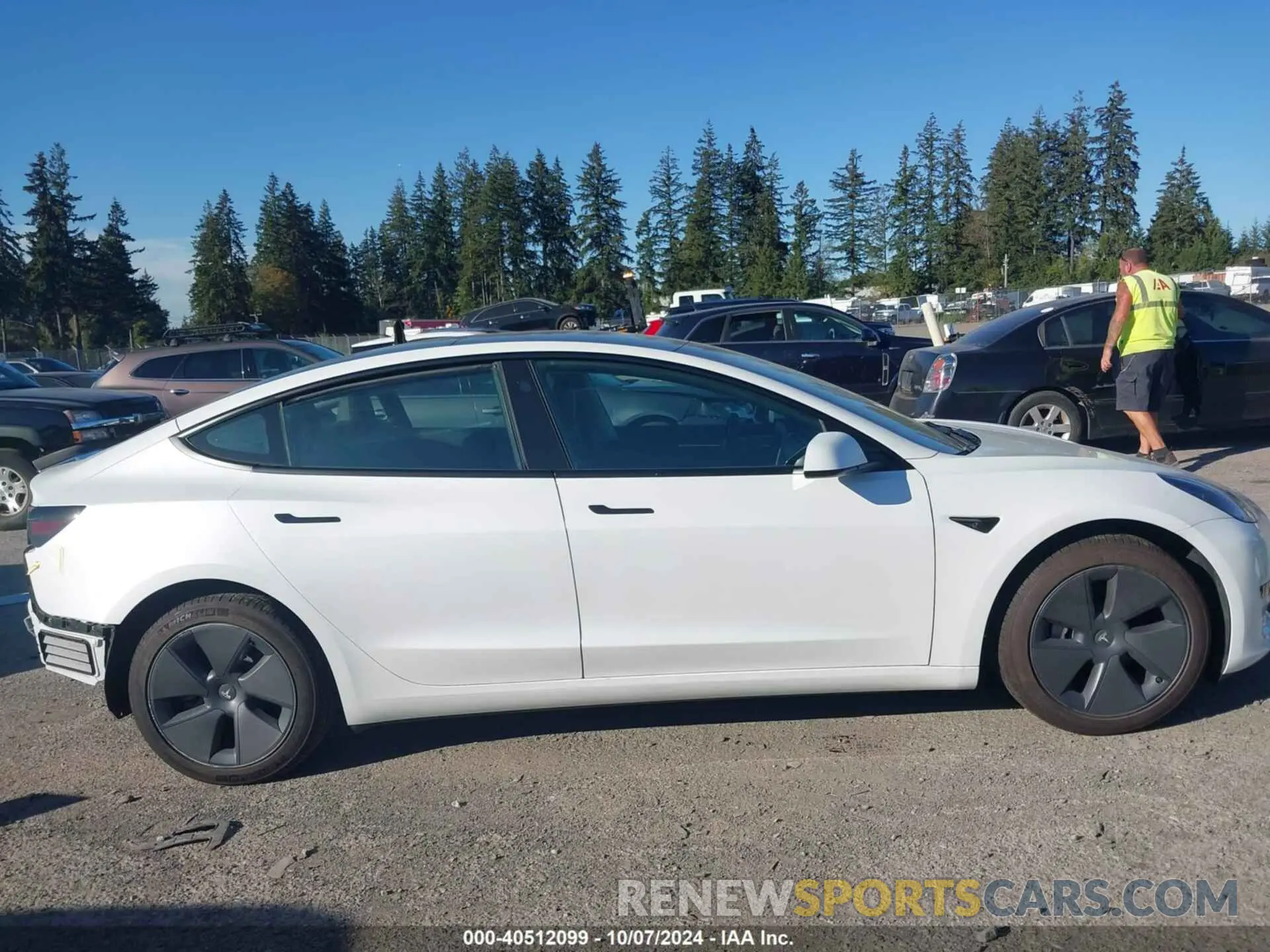 14 Photograph of a damaged car 5YJ3E1EA4PF577499 TESLA MODEL 3 2023