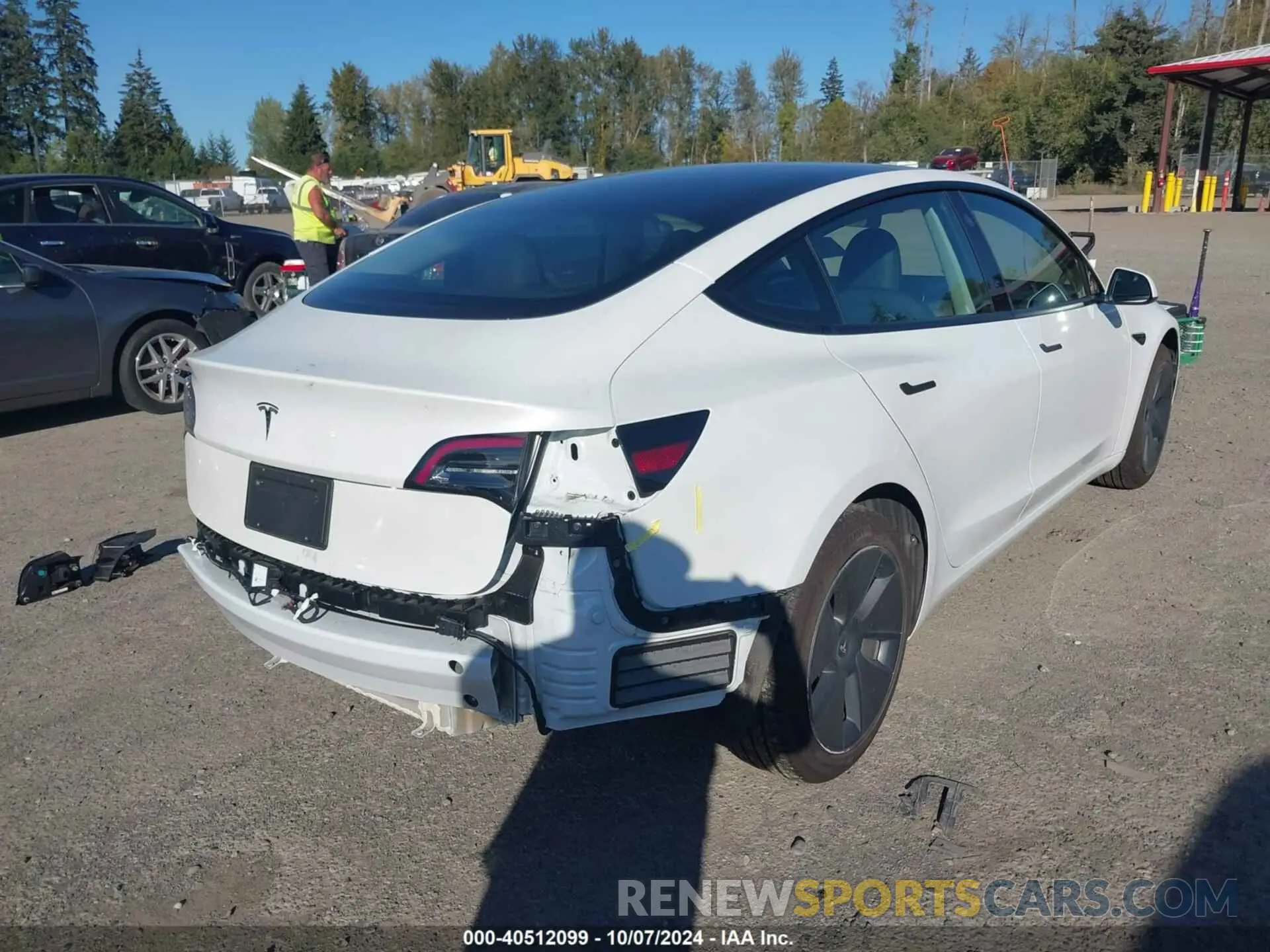 4 Photograph of a damaged car 5YJ3E1EA4PF577499 TESLA MODEL 3 2023