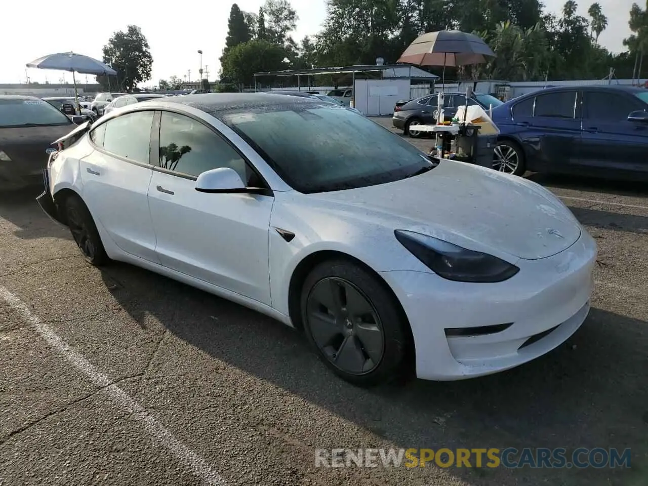 4 Photograph of a damaged car 5YJ3E1EA4PF581973 TESLA MODEL 3 2023