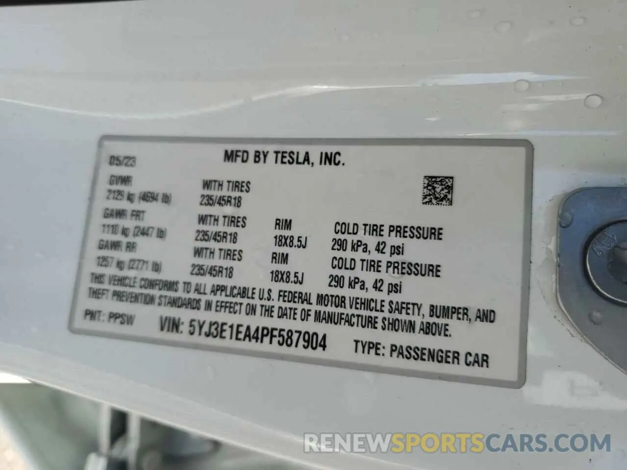 12 Photograph of a damaged car 5YJ3E1EA4PF587904 TESLA MODEL 3 2023