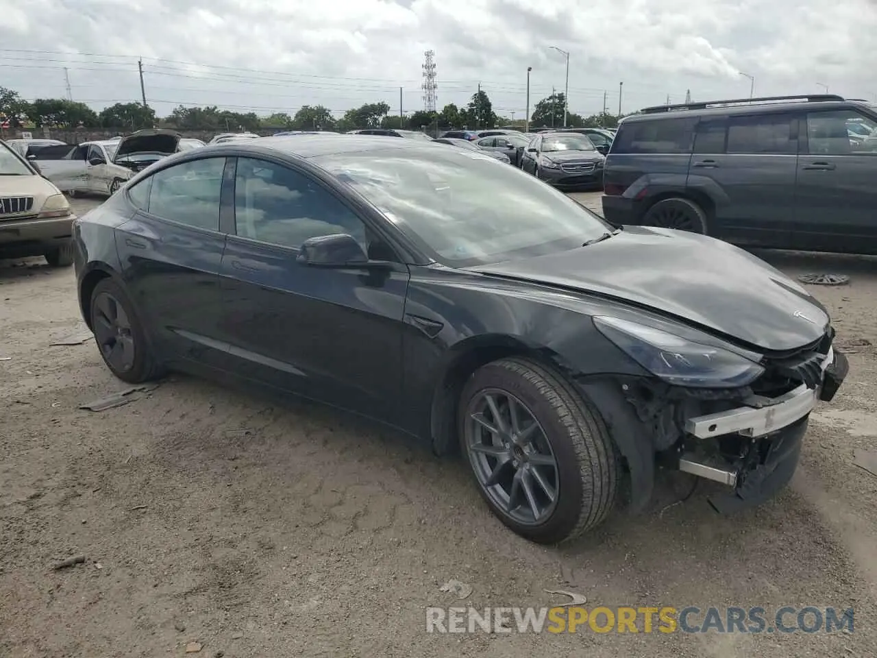 4 Photograph of a damaged car 5YJ3E1EA4PF601185 TESLA MODEL 3 2023