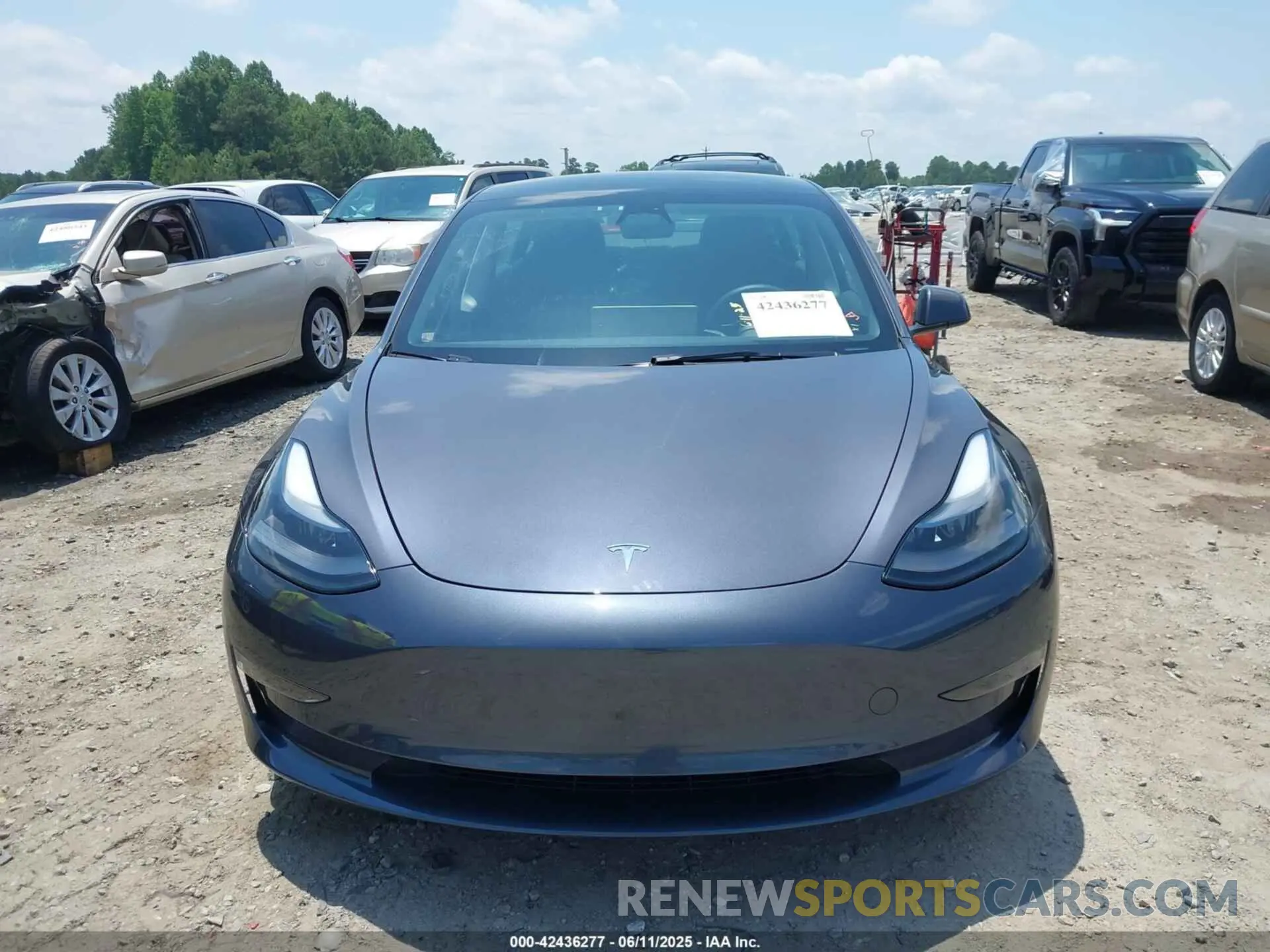12 Photograph of a damaged car 5YJ3E1EA4PF615457 TESLA MODEL 3 2023