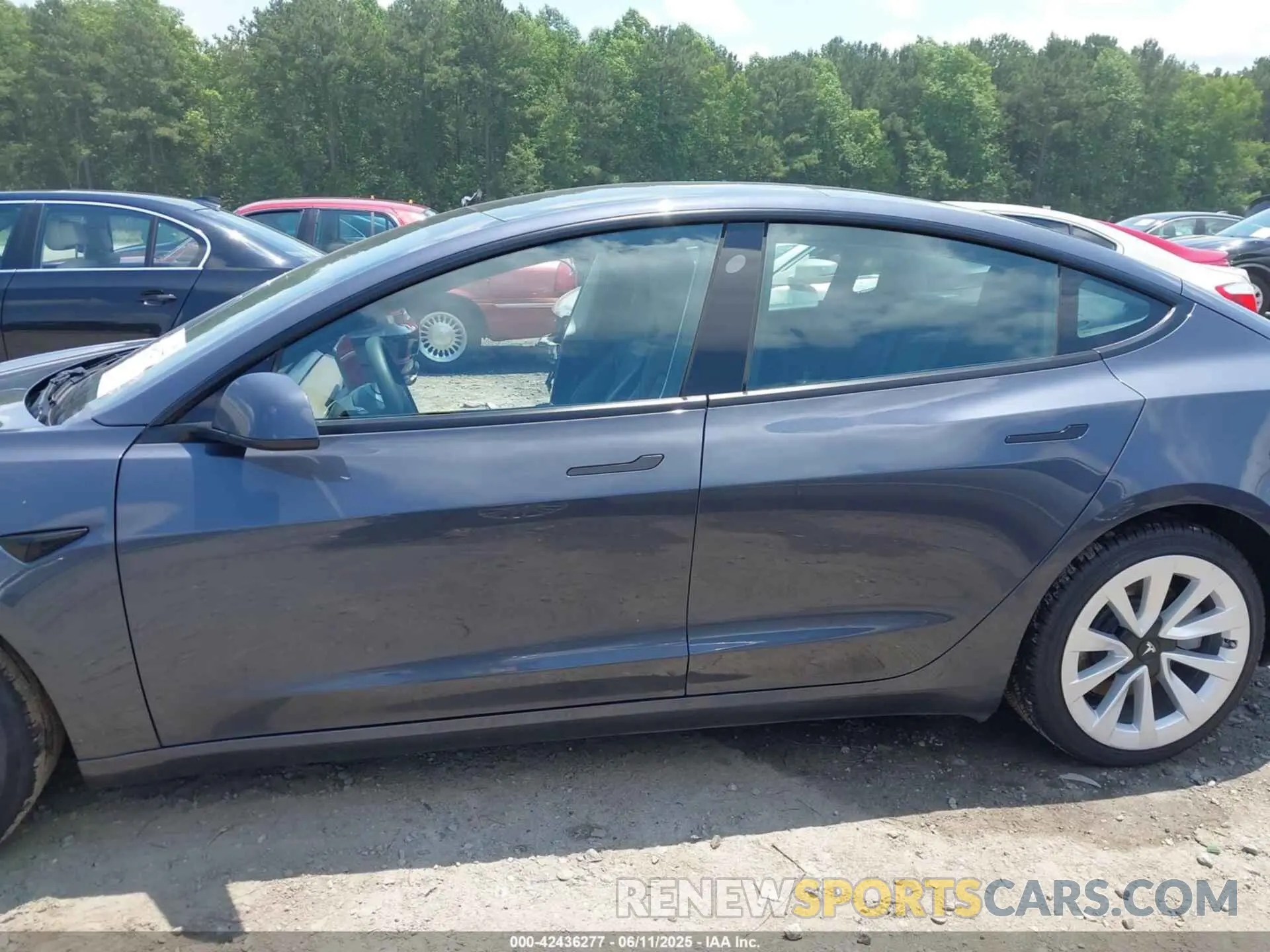 14 Photograph of a damaged car 5YJ3E1EA4PF615457 TESLA MODEL 3 2023