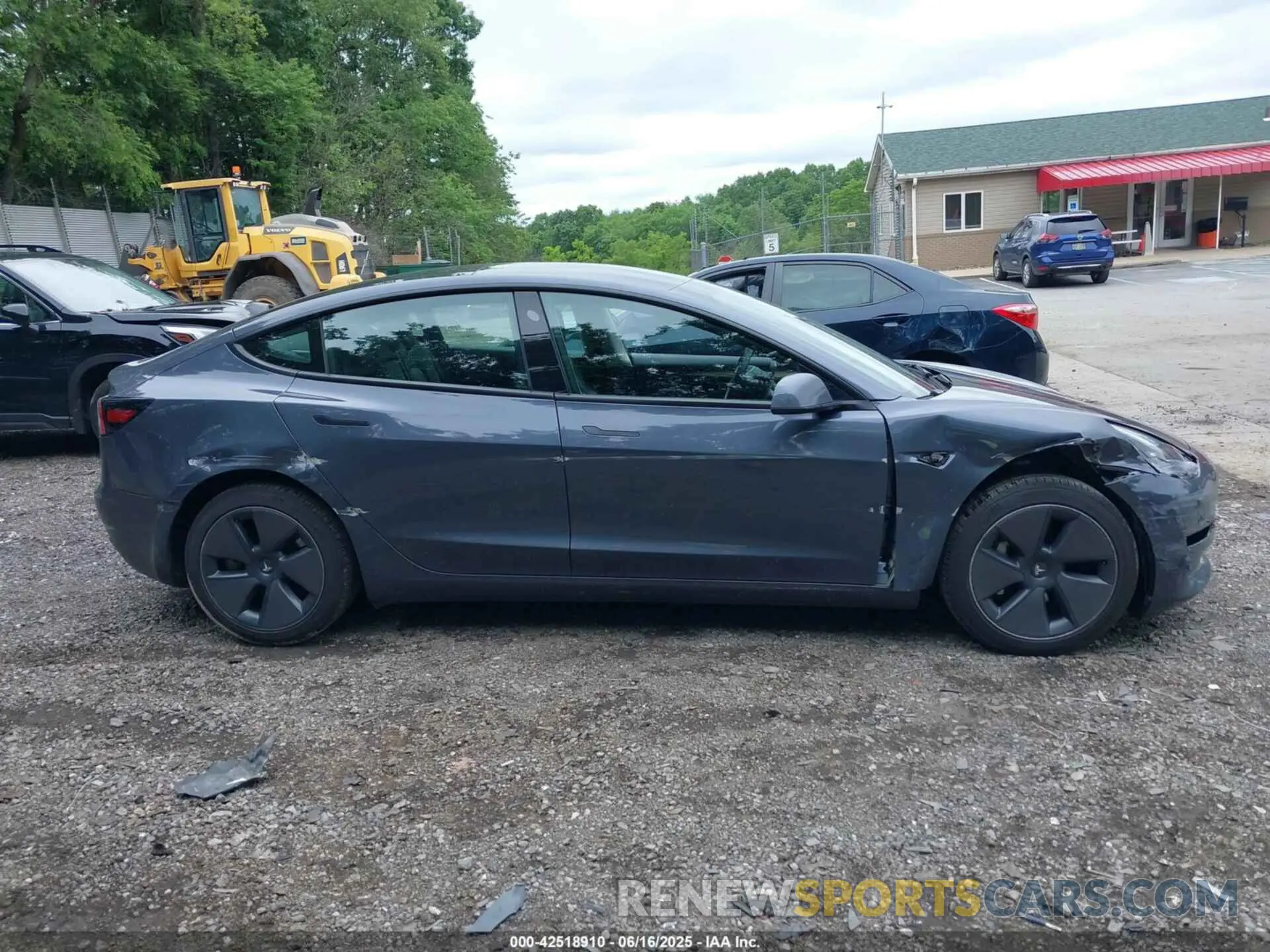 14 Photograph of a damaged car 5YJ3E1EA4PF657112 TESLA MODEL 3 2023