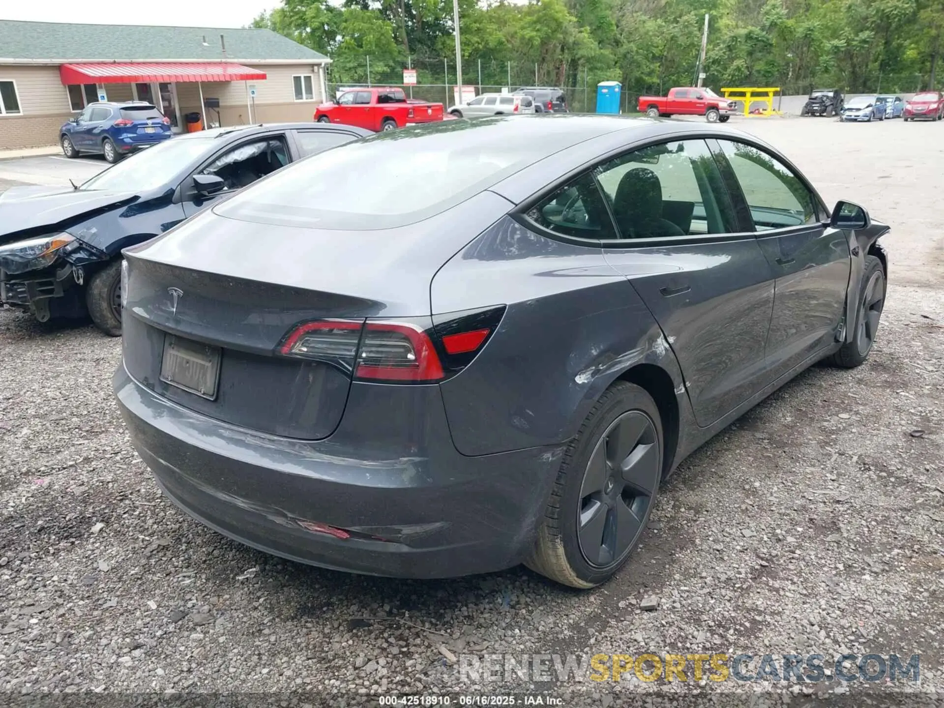 4 Photograph of a damaged car 5YJ3E1EA4PF657112 TESLA MODEL 3 2023