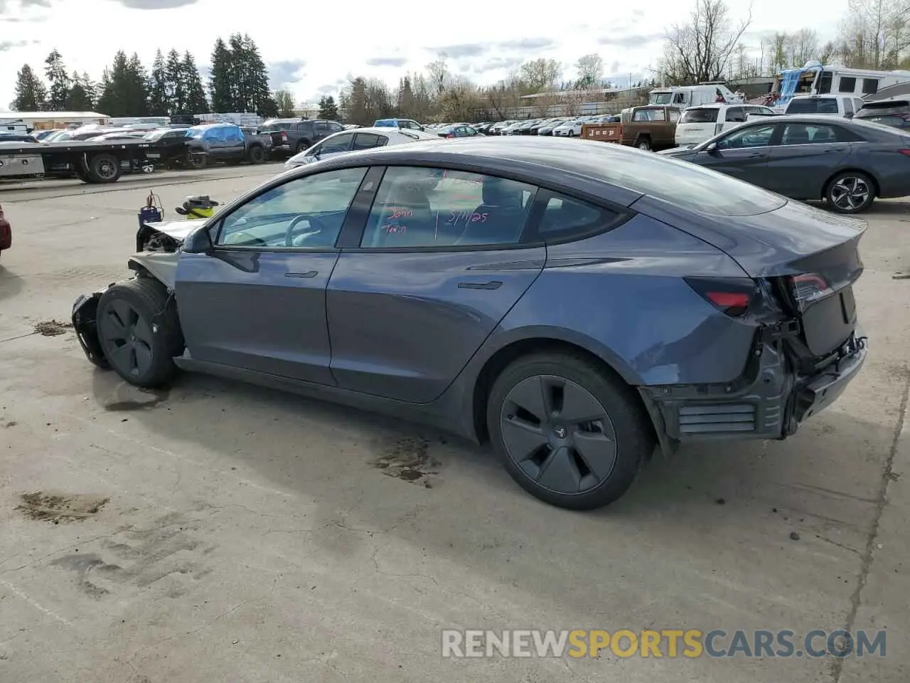 2 Photograph of a damaged car 5YJ3E1EA4PF695438 TESLA MODEL 3 2023