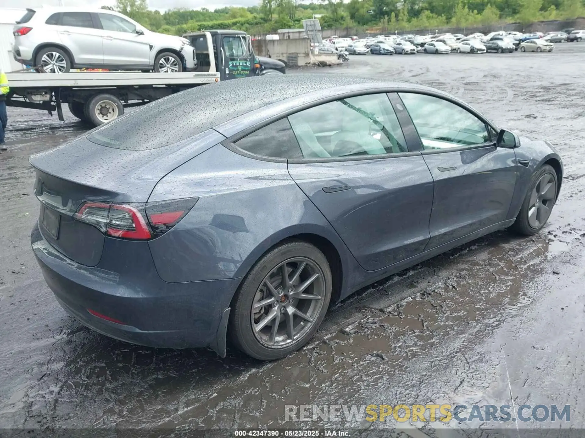 4 Photograph of a damaged car 5YJ3E1EA5PF384620 TESLA MODEL 3 2023