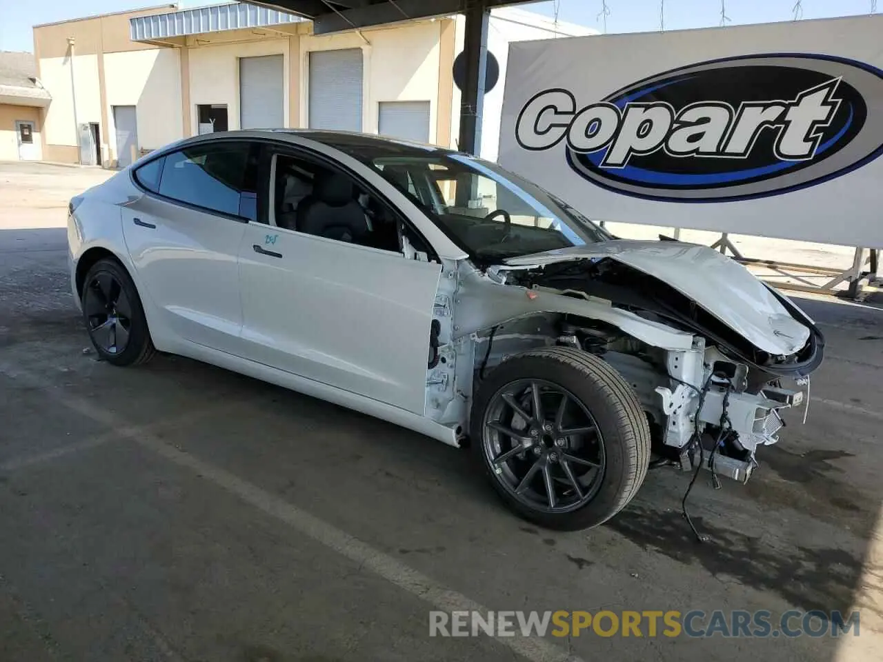 4 Photograph of a damaged car 5YJ3E1EA5PF400282 TESLA MODEL 3 2023