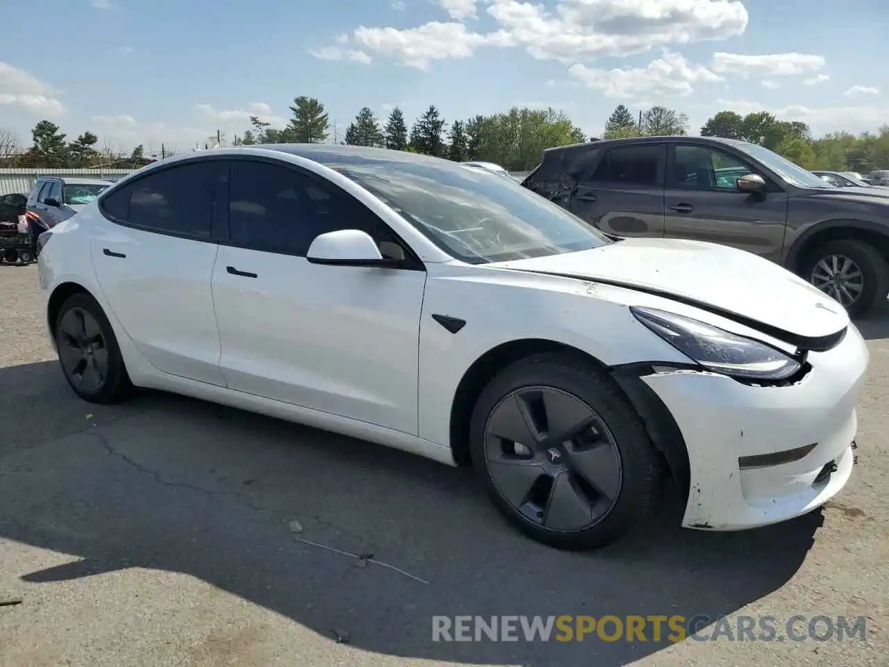 4 Photograph of a damaged car 5YJ3E1EA5PF454360 TESLA MODEL 3 2023