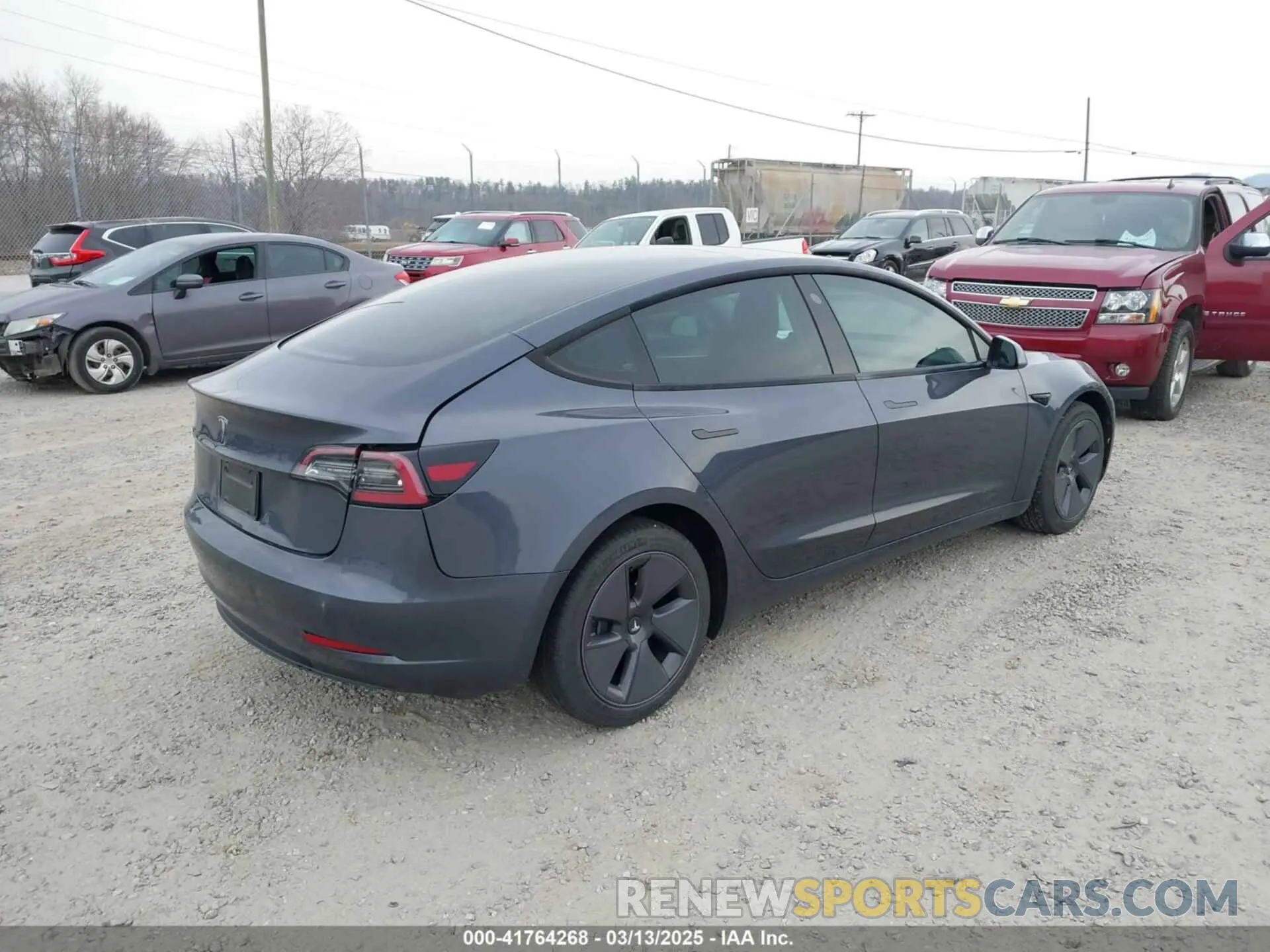 4 Photograph of a damaged car 5YJ3E1EA5PF474382 TESLA MODEL 3 2023