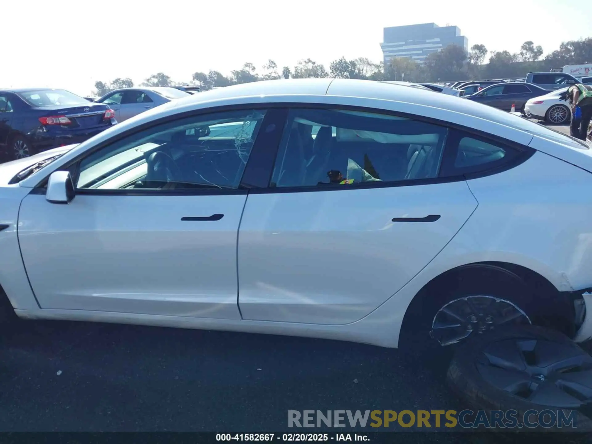 14 Photograph of a damaged car 5YJ3E1EA5PF487939 TESLA MODEL 3 2023