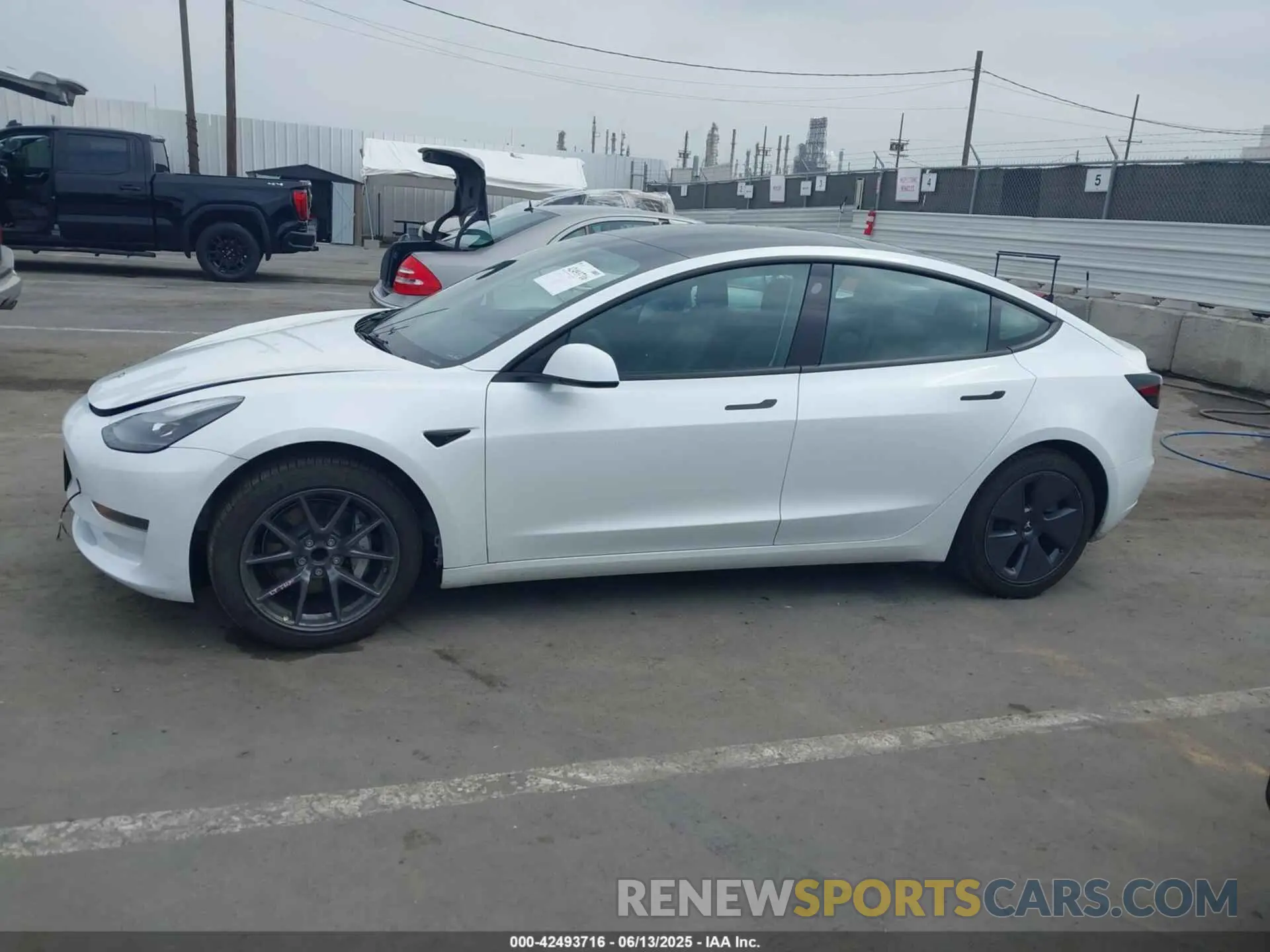 13 Photograph of a damaged car 5YJ3E1EA5PF496902 TESLA MODEL 3 2023