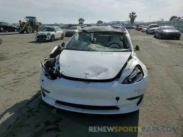 11 Photograph of a damaged car 5YJ3E1EA5PF497788 TESLA MODEL 3 2023