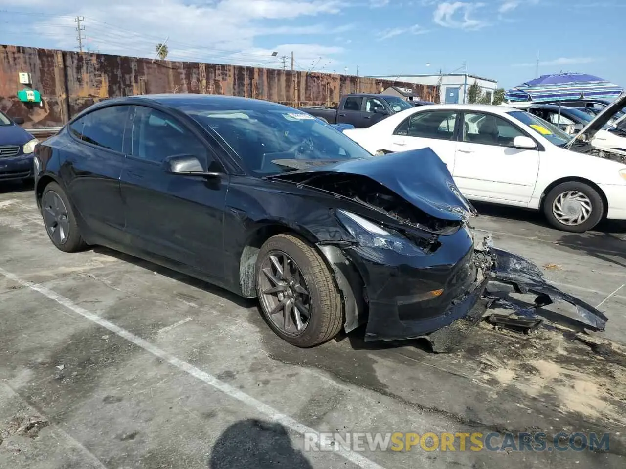 4 Photograph of a damaged car 5YJ3E1EA5PF499296 TESLA MODEL 3 2023