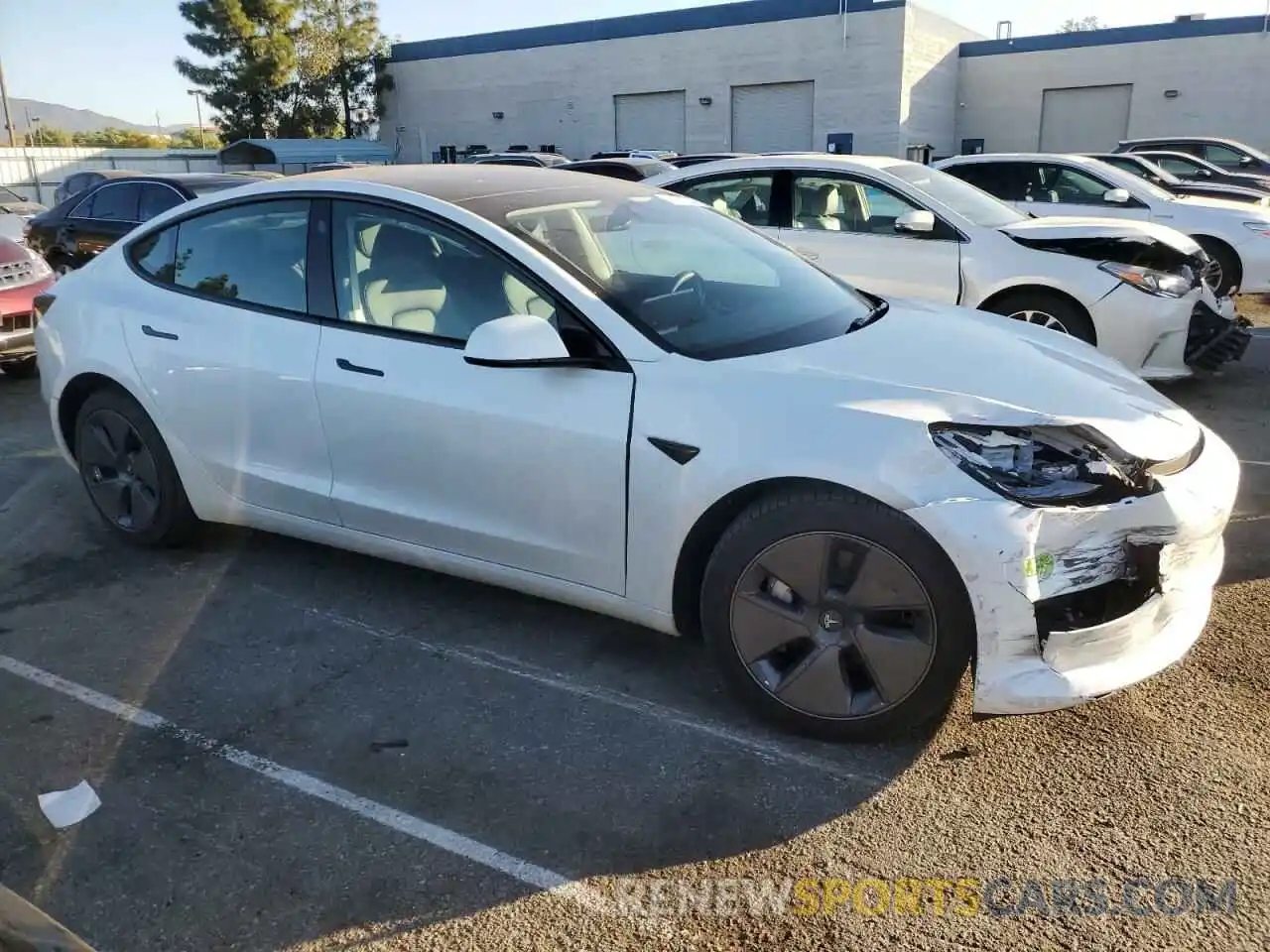 4 Photograph of a damaged car 5YJ3E1EA5PF514878 TESLA MODEL 3 2023