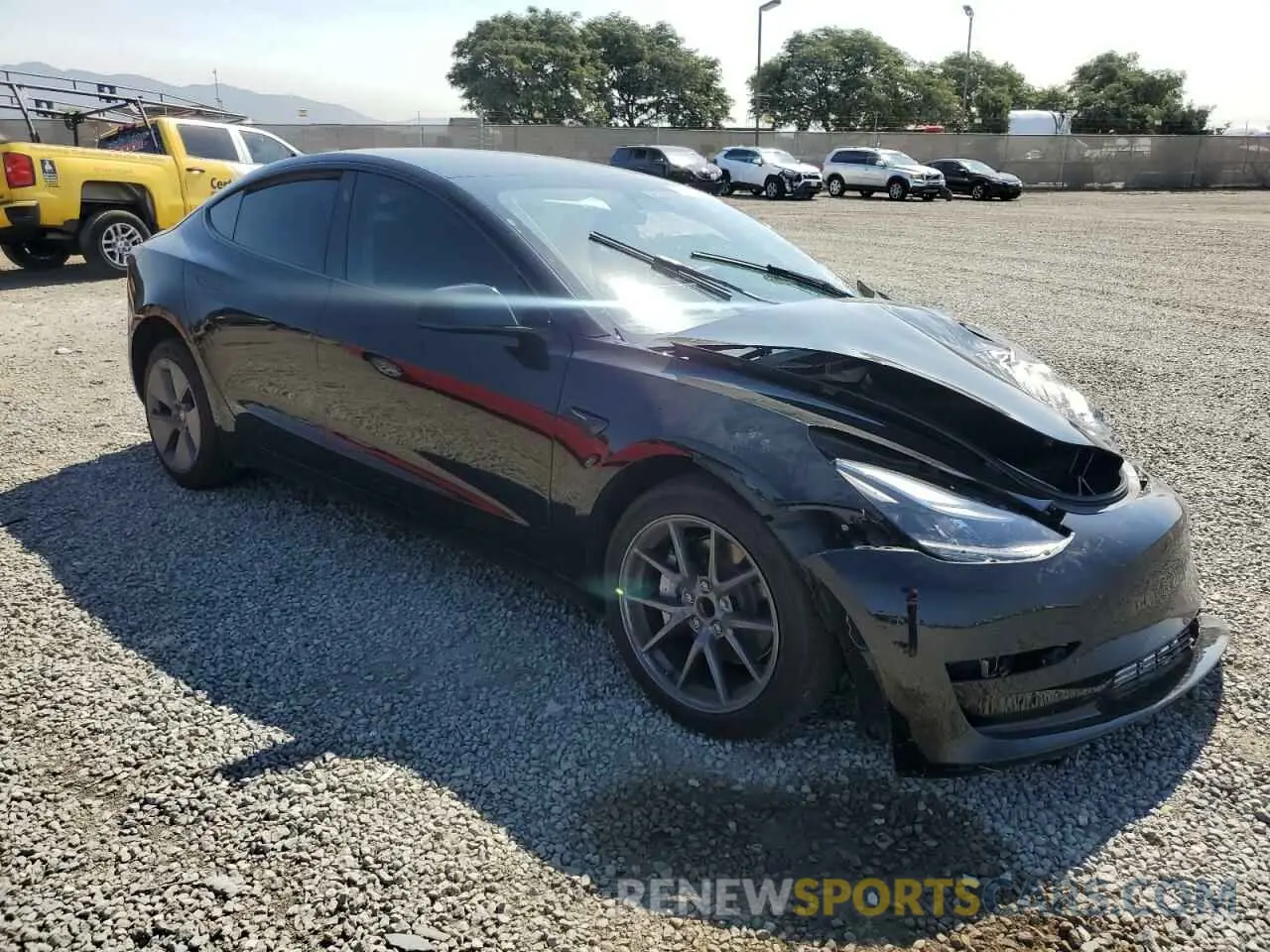 4 Photograph of a damaged car 5YJ3E1EA5PF568892 TESLA MODEL 3 2023